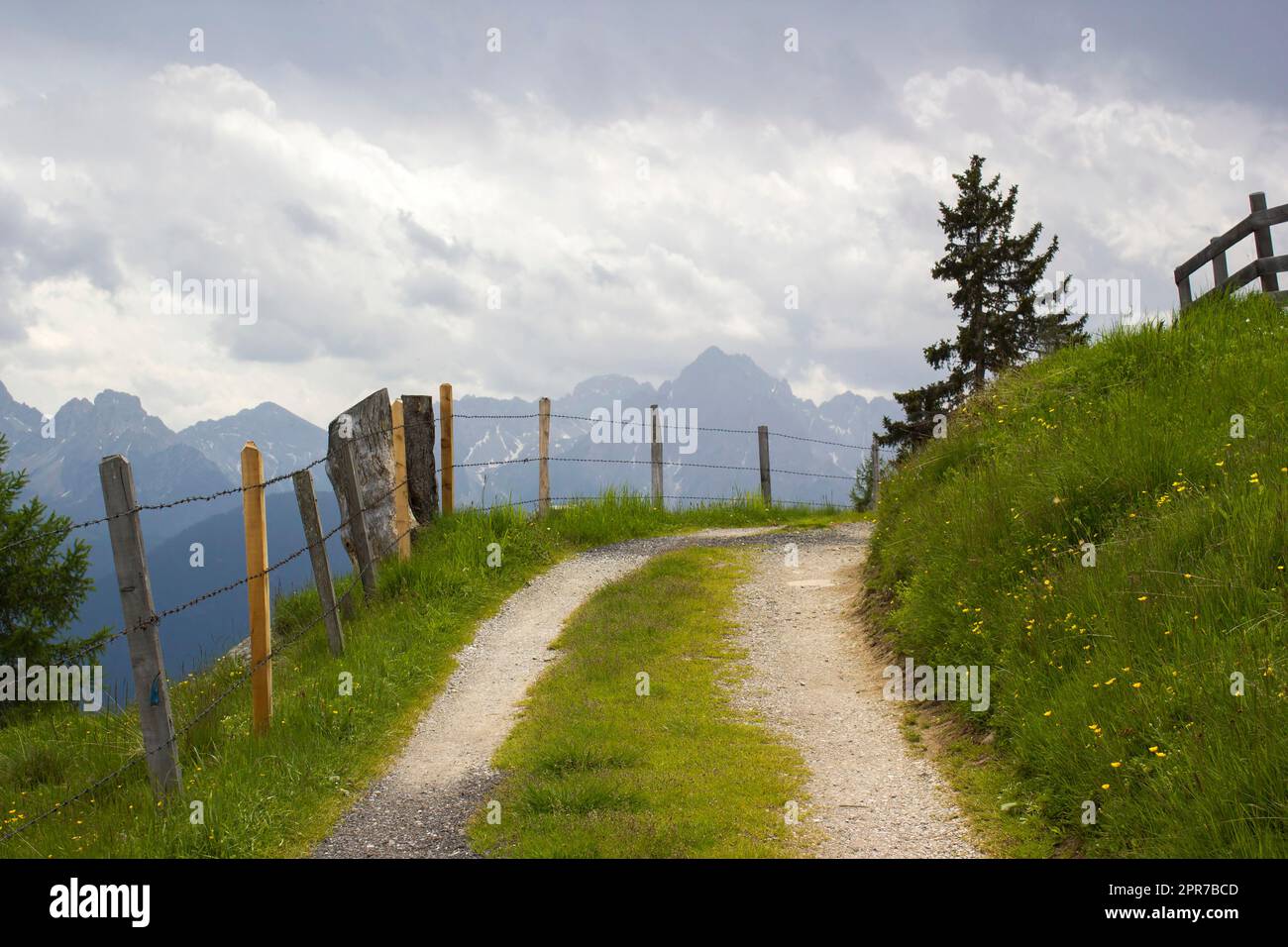 Landscape of Lienz Dolomites in Austria. Road and panorama of massive Alpine mountains Stock Photo