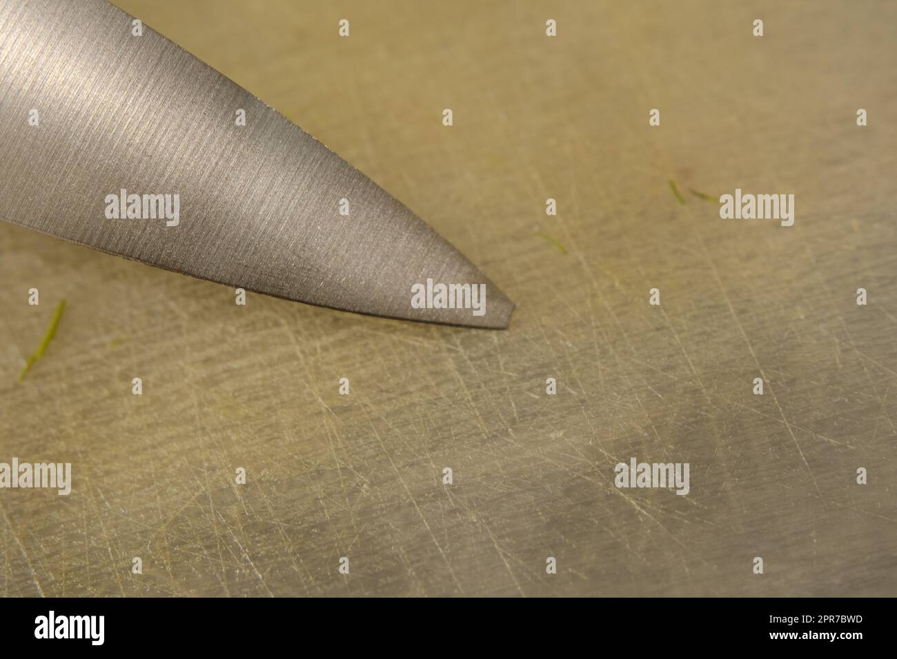 close up old knife with a chipped blade. broken substandard knife