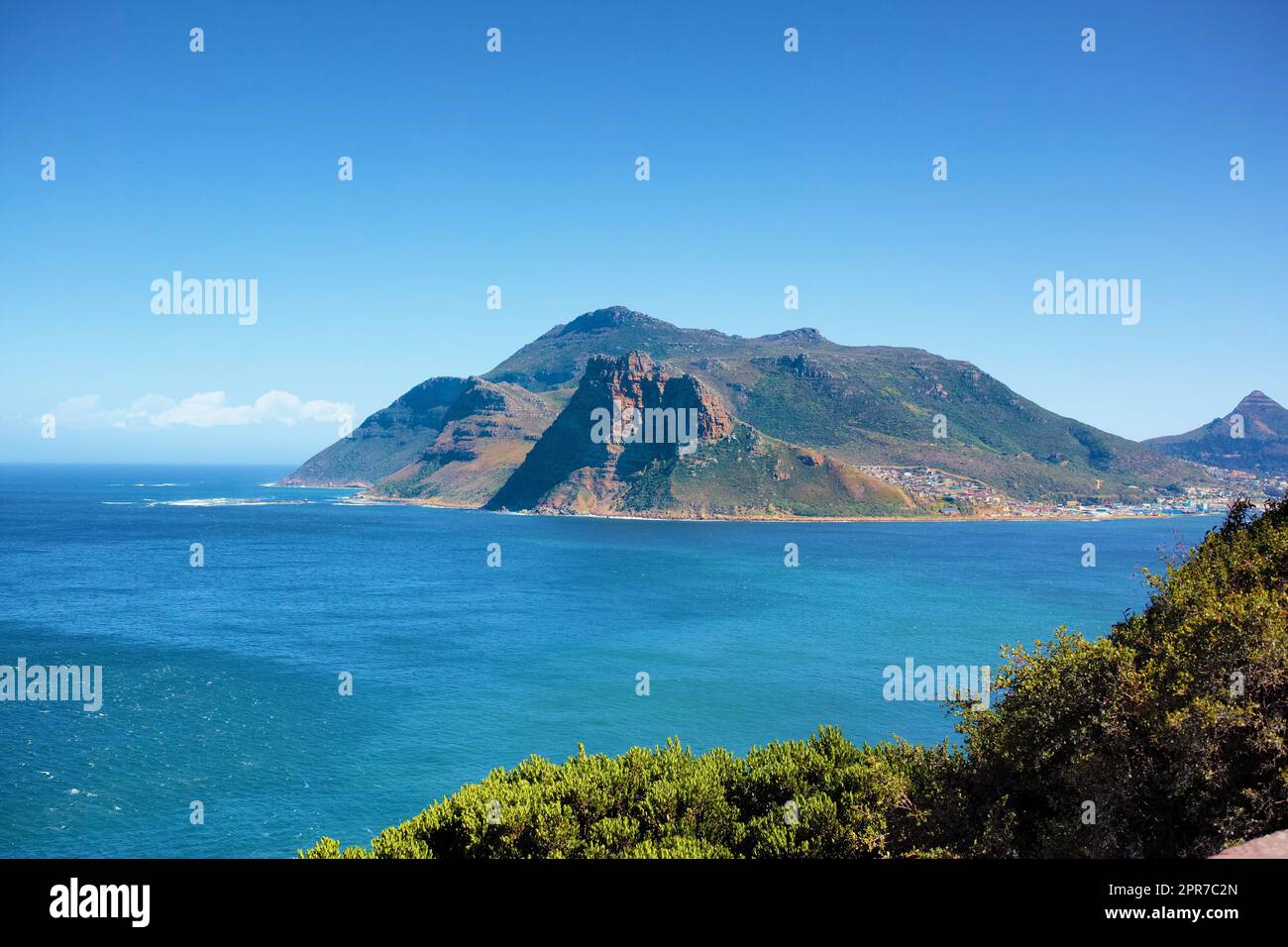 A mountain in Hout Bay, South Africa on a summer day with blue sky copyspace. Panaramona view of a mountain peak, popular tourist attraction with hiking rails for travellers on adventurous vacation Stock Photo