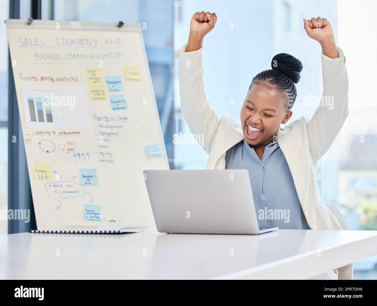 Bring my prize my way. a young businesswoman cheering in excitement while working on her laptop. Stock Photo
