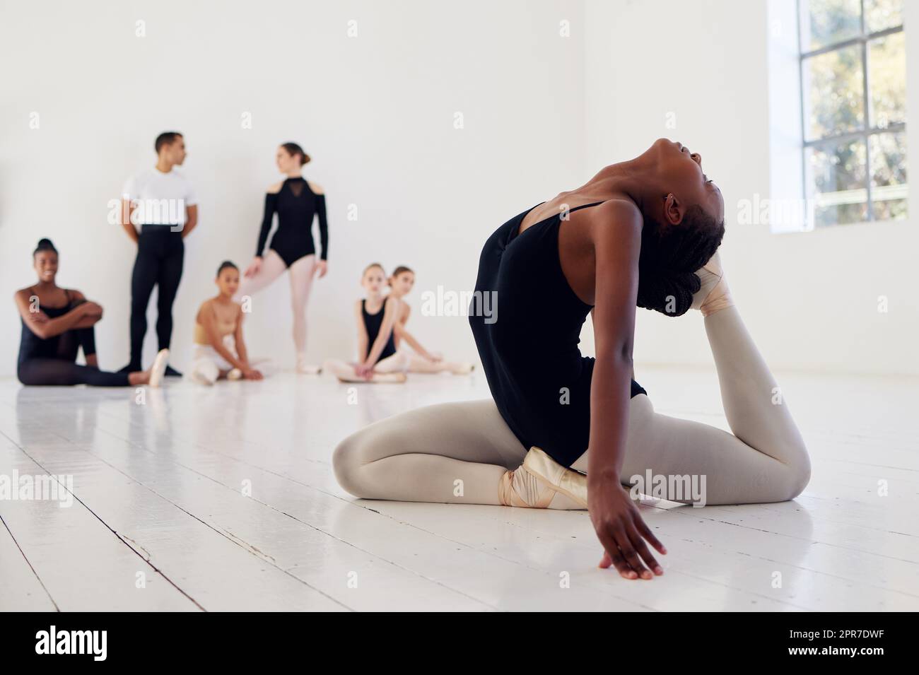 Dancing is very much a confession. a group of ballet dancers practicing