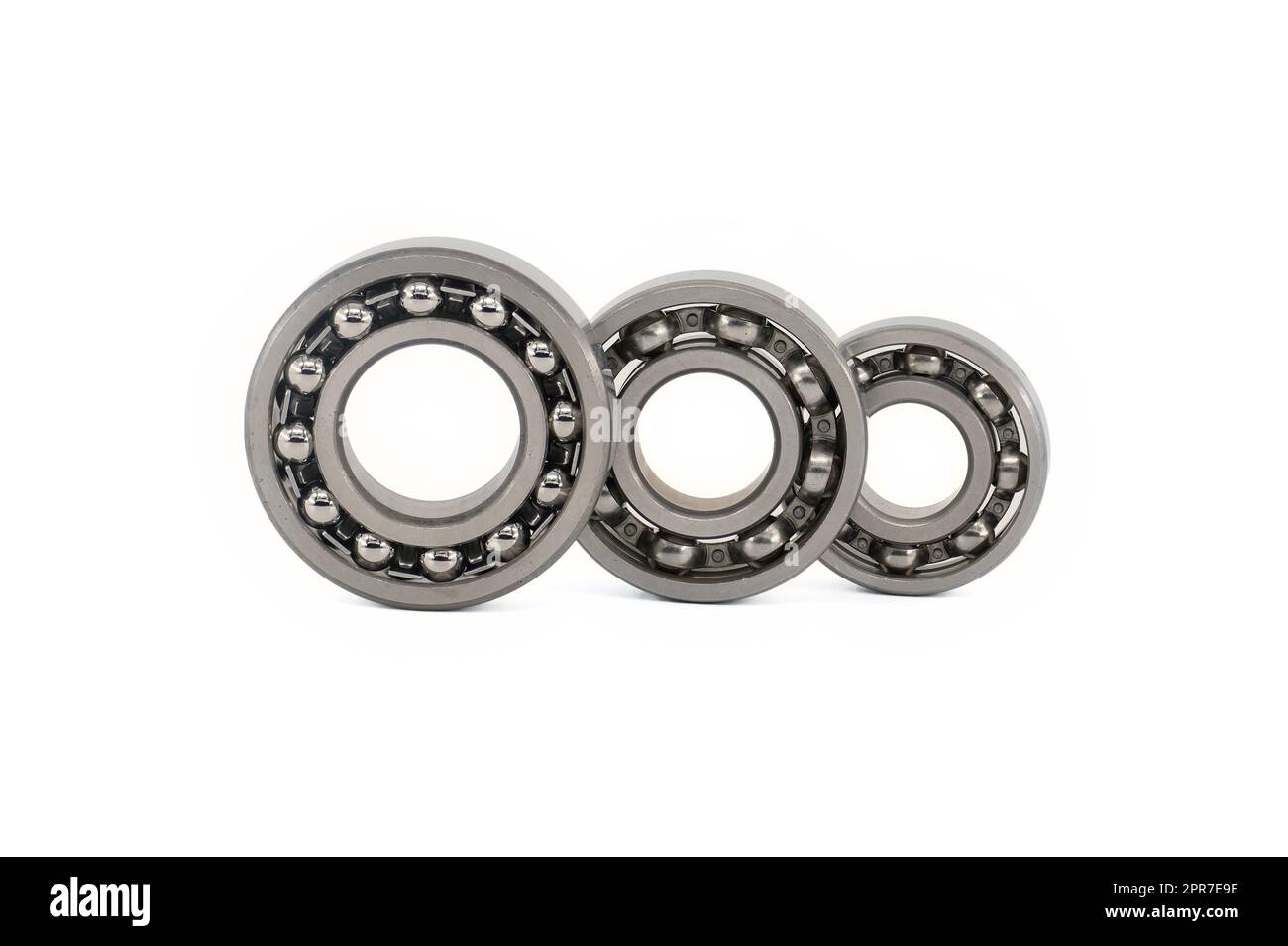 Set of various ball and roller bearings on white background. Car