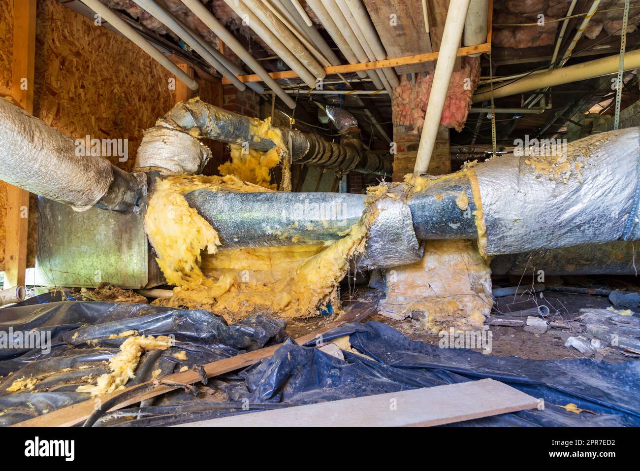 Air Conditioner supply duct work in need of repair and replacement. Stock Photo