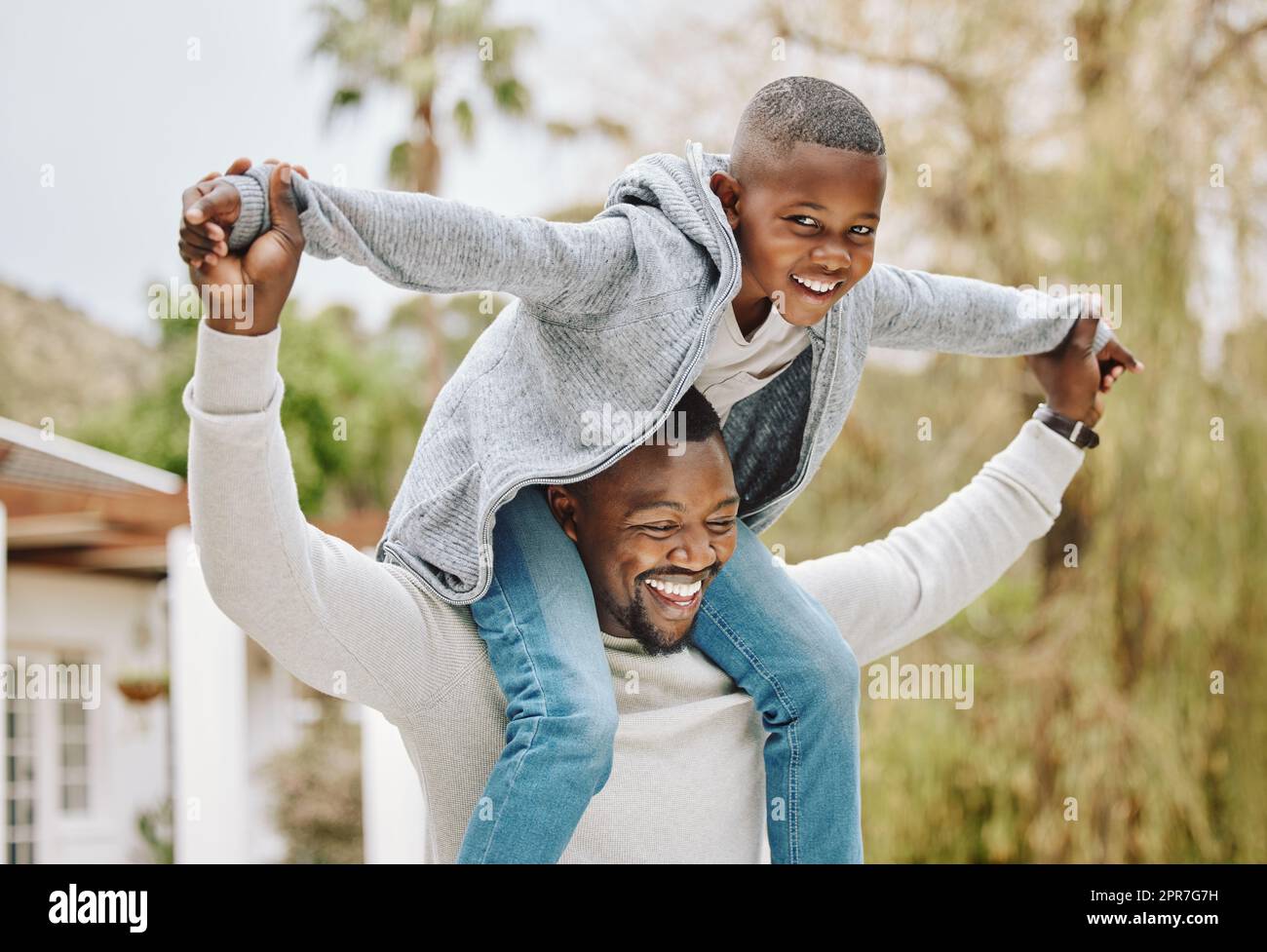 My dad is stronger than your dad. Cropped portrait of an adorable little boy sitting on his