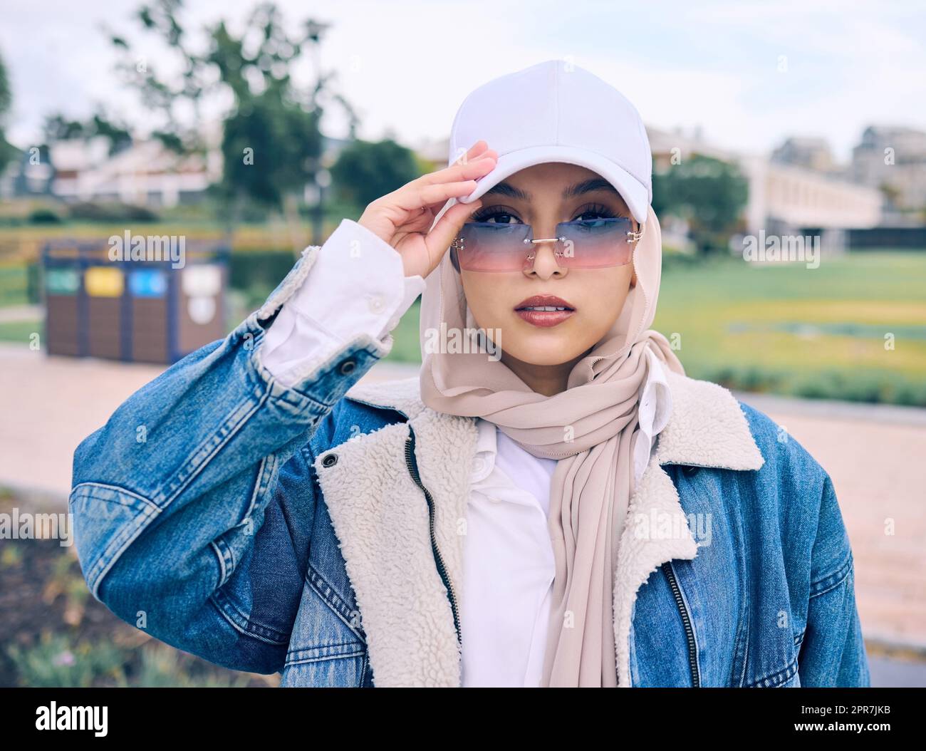 Muslim woman in hijab sunglasses hi-res stock photography and