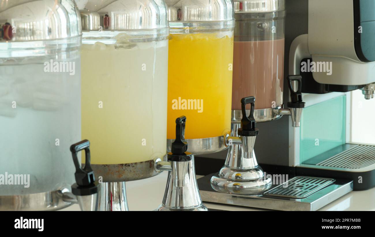 Hotel beverages dispensers. Drinking water, lemonade, orange juice