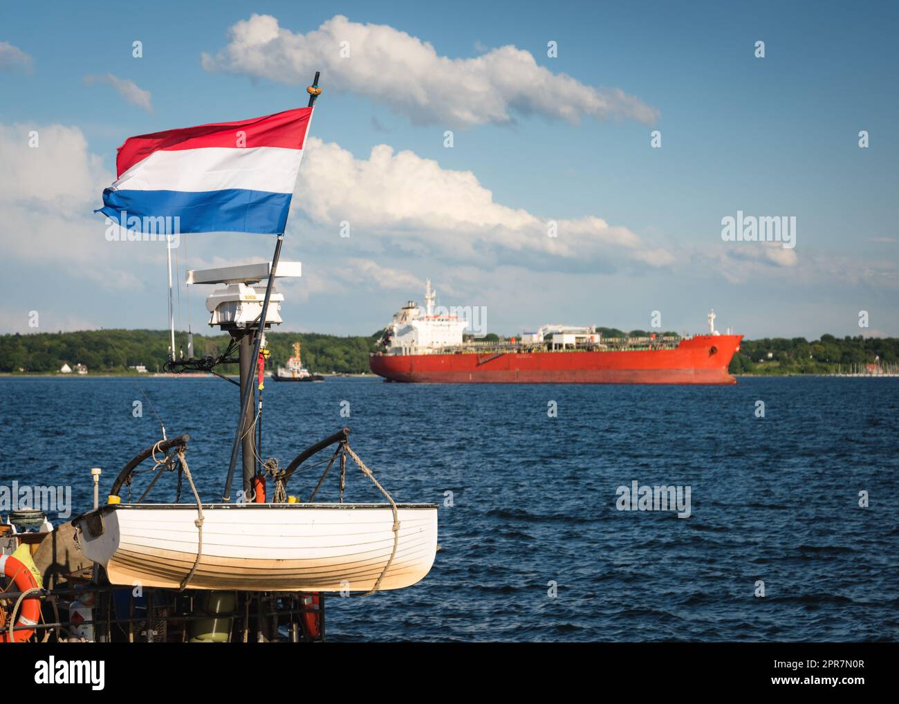 Freight ship passing Kiel Canal (NOK) on its way to the Baltic Sea. Stock Photo