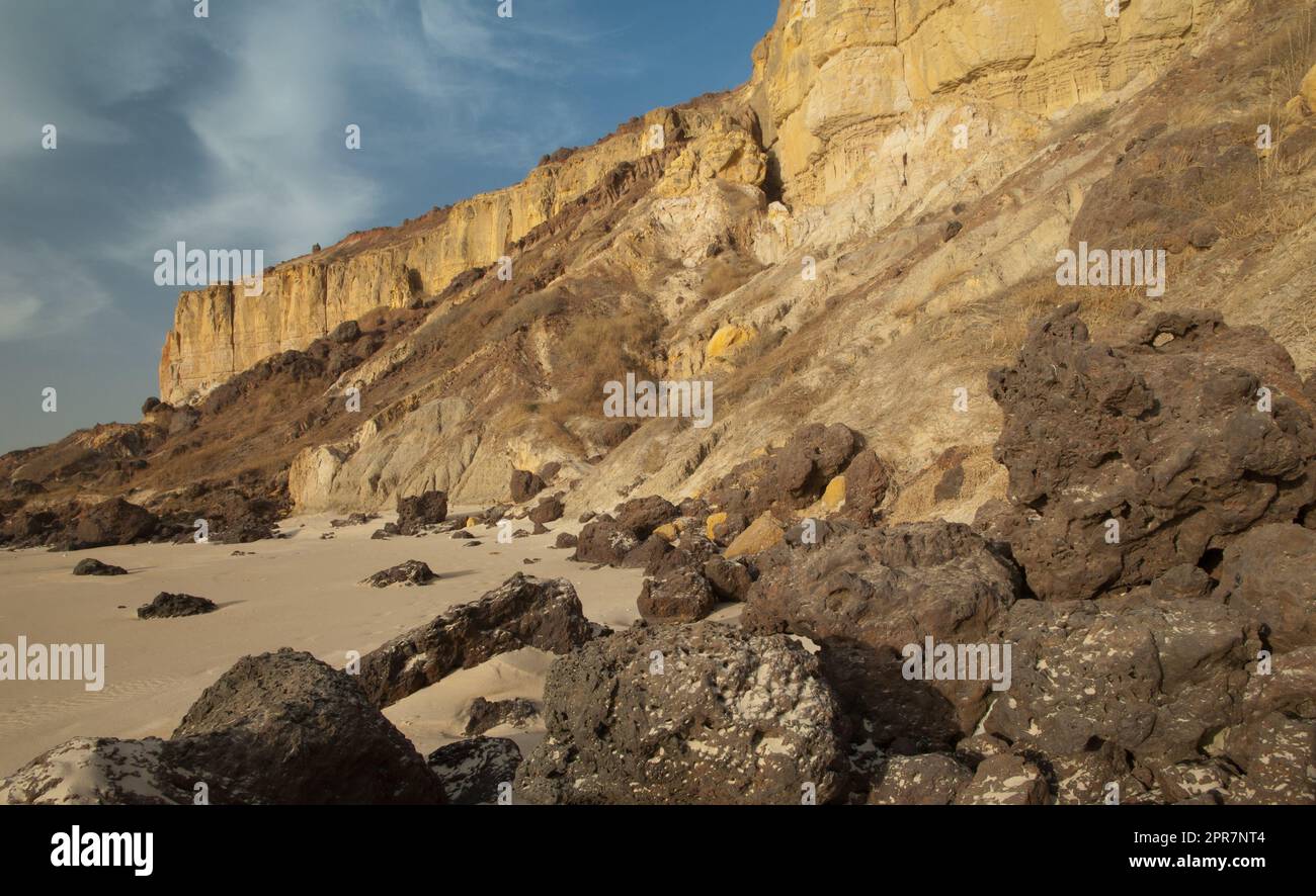 Beach and sea cliff in the Natural Reserve of Popenguine. Stock Photo