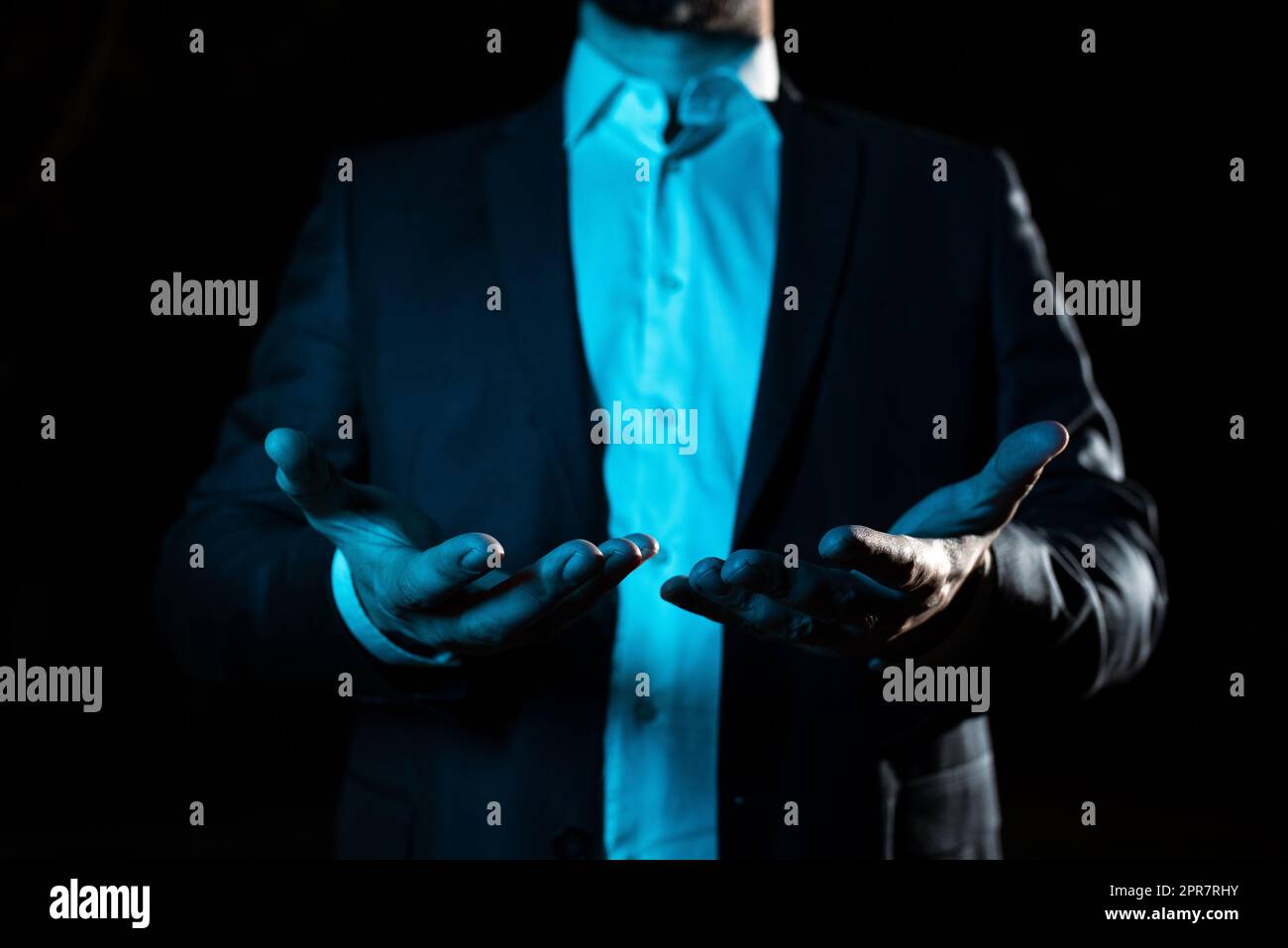 Hands Holding Important Informations. Palms Pointing Crutial Announcements. Businessman Presenting Recent Updates. Executive Showing Late Achievements. Stock Photo