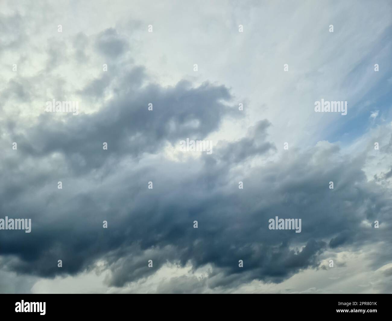 Beautiful fluffy white cloud formations in a deep blue summer sky Stock ...