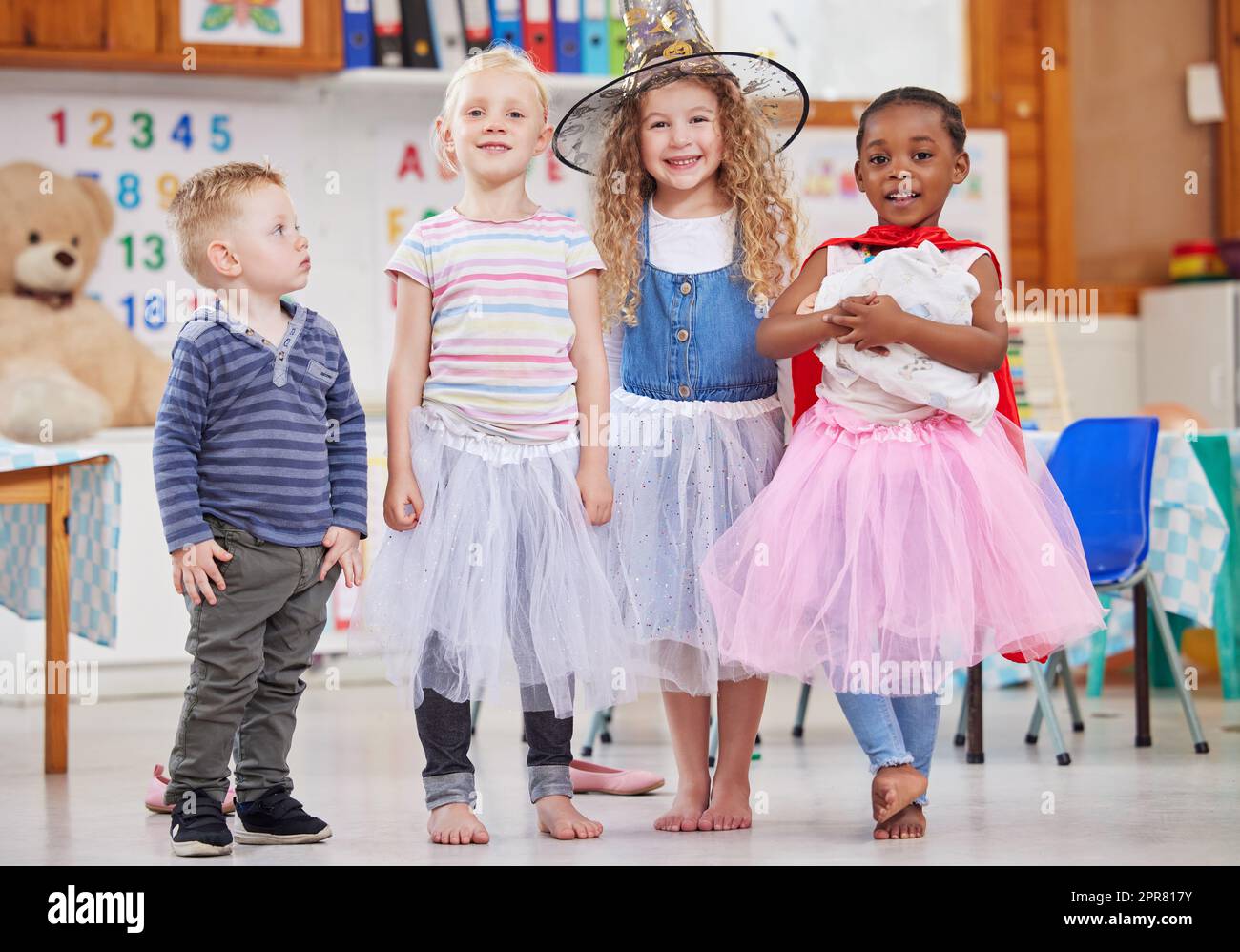 We love dressing up and playing together. Shot of a group of preschool