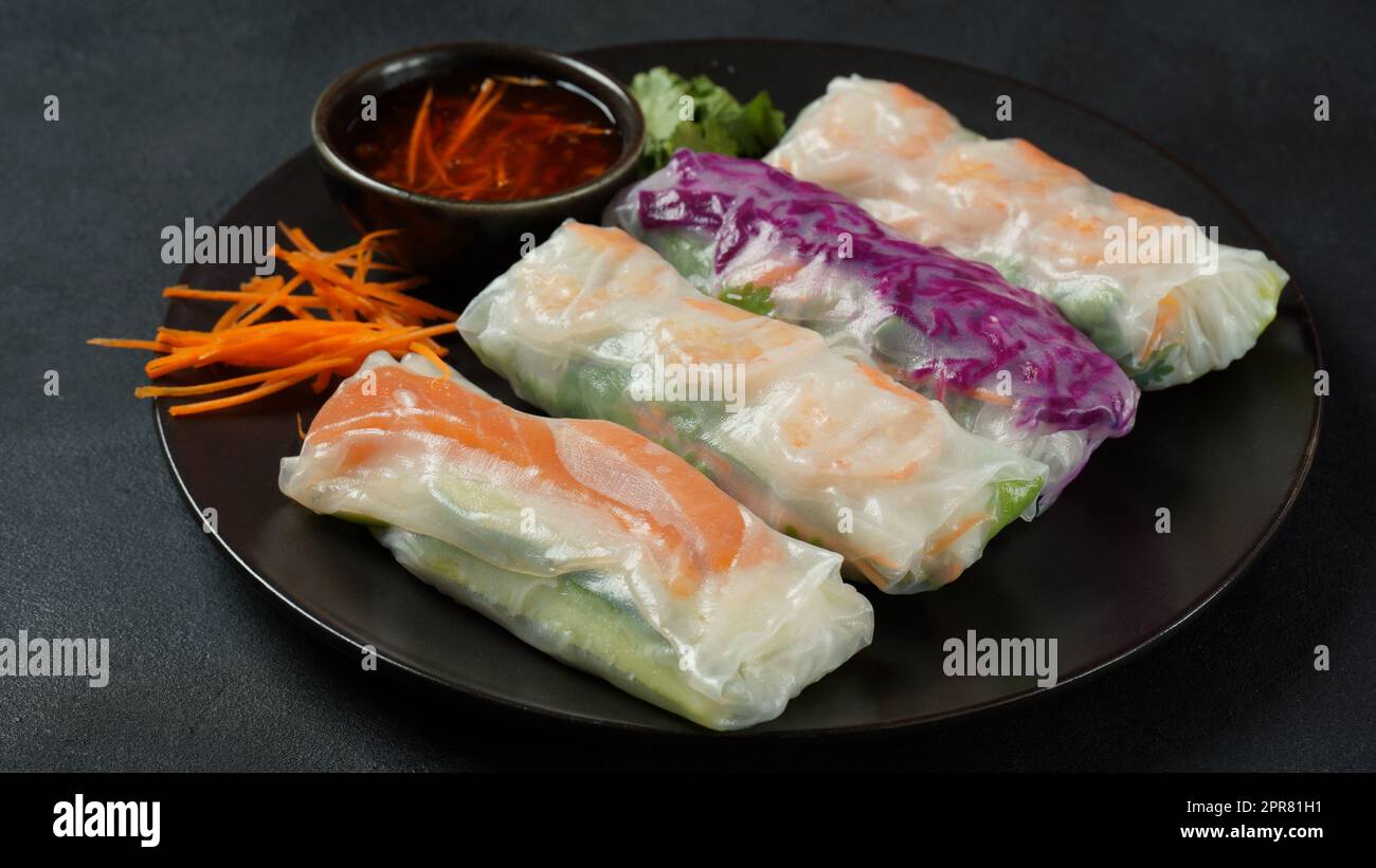 Vietnamese Spring Rolls Goi Cuon or Nem Cuon, filled with prawns, herbs