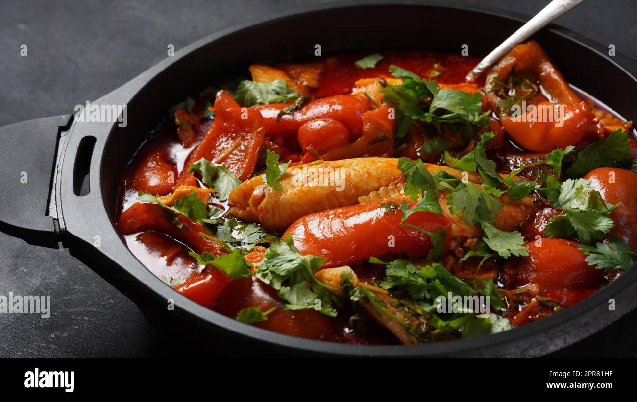Moroccan fish  with chermoula, red peppers and preserved lemon. Spicy traditional  Moroccan food Stock Photo