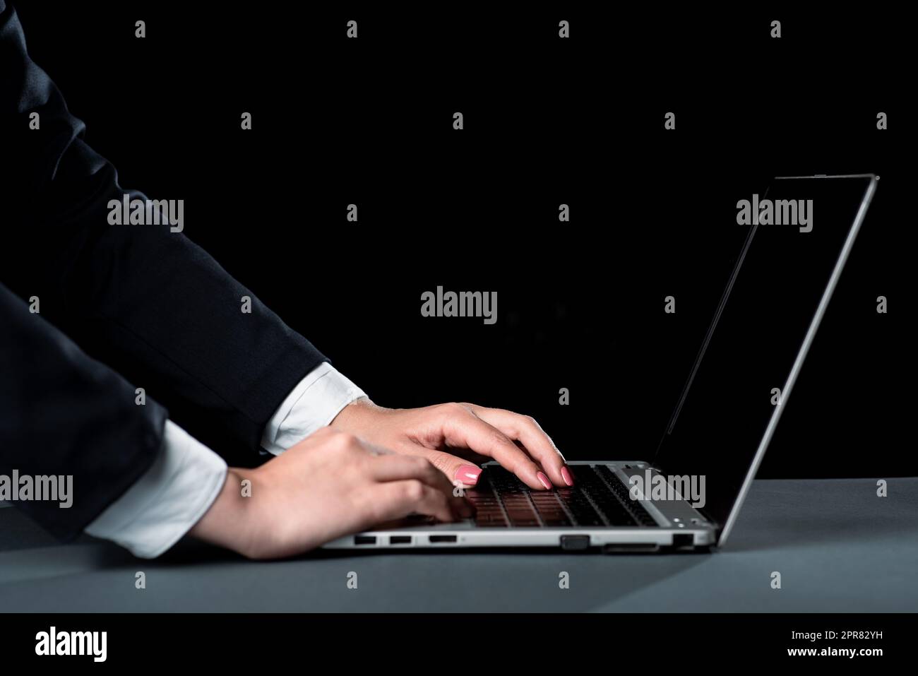 Businesswoman Typing Recent Updates On Lap Top Keyboard On Desk. Woman ...