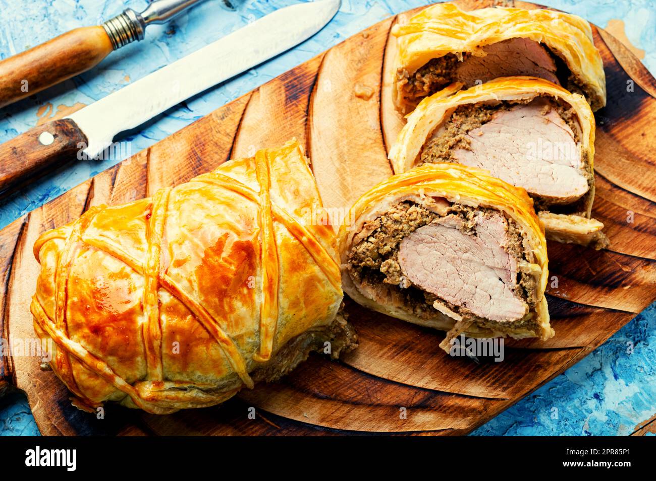 Wellington pork, pork tenderloin baked with mushrooms in puff pastry