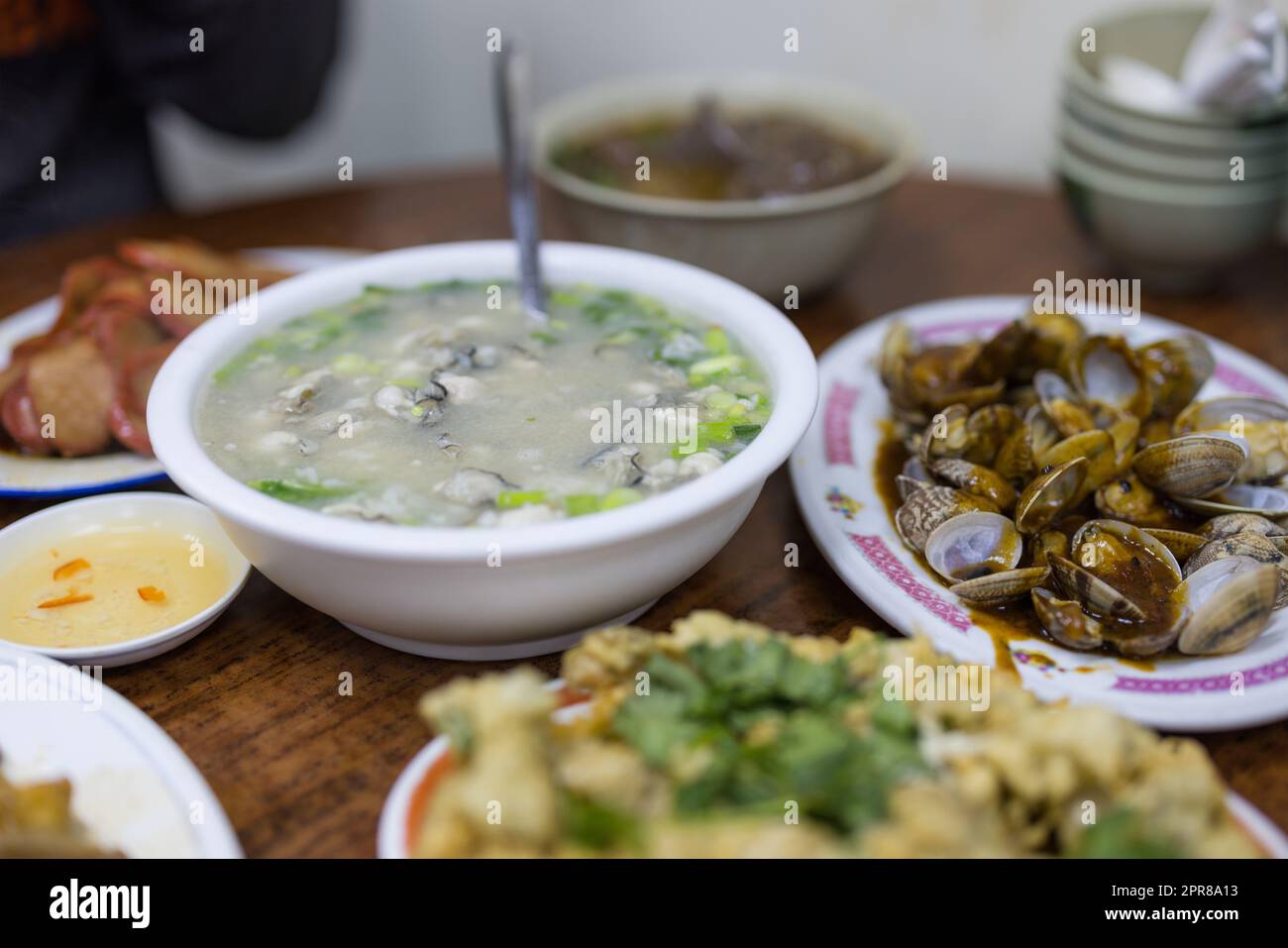 Chaozhou cuisine oyster congee and fry clam Stock Photo