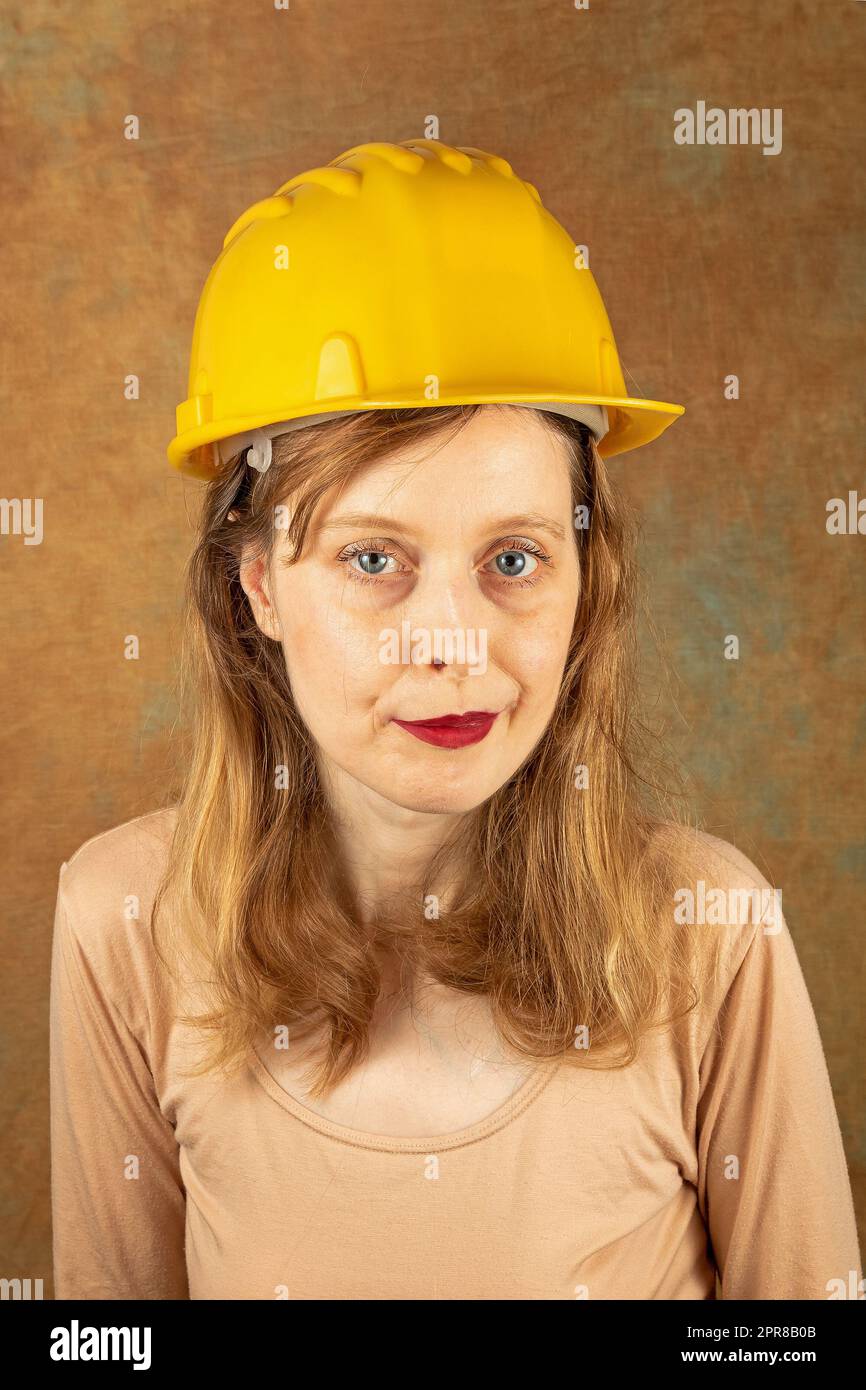 Female construction worker with helmet Stock Photo