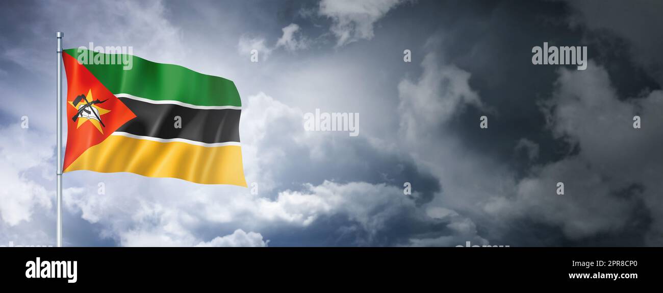 Mozambique flag on a cloudy sky Stock Photo