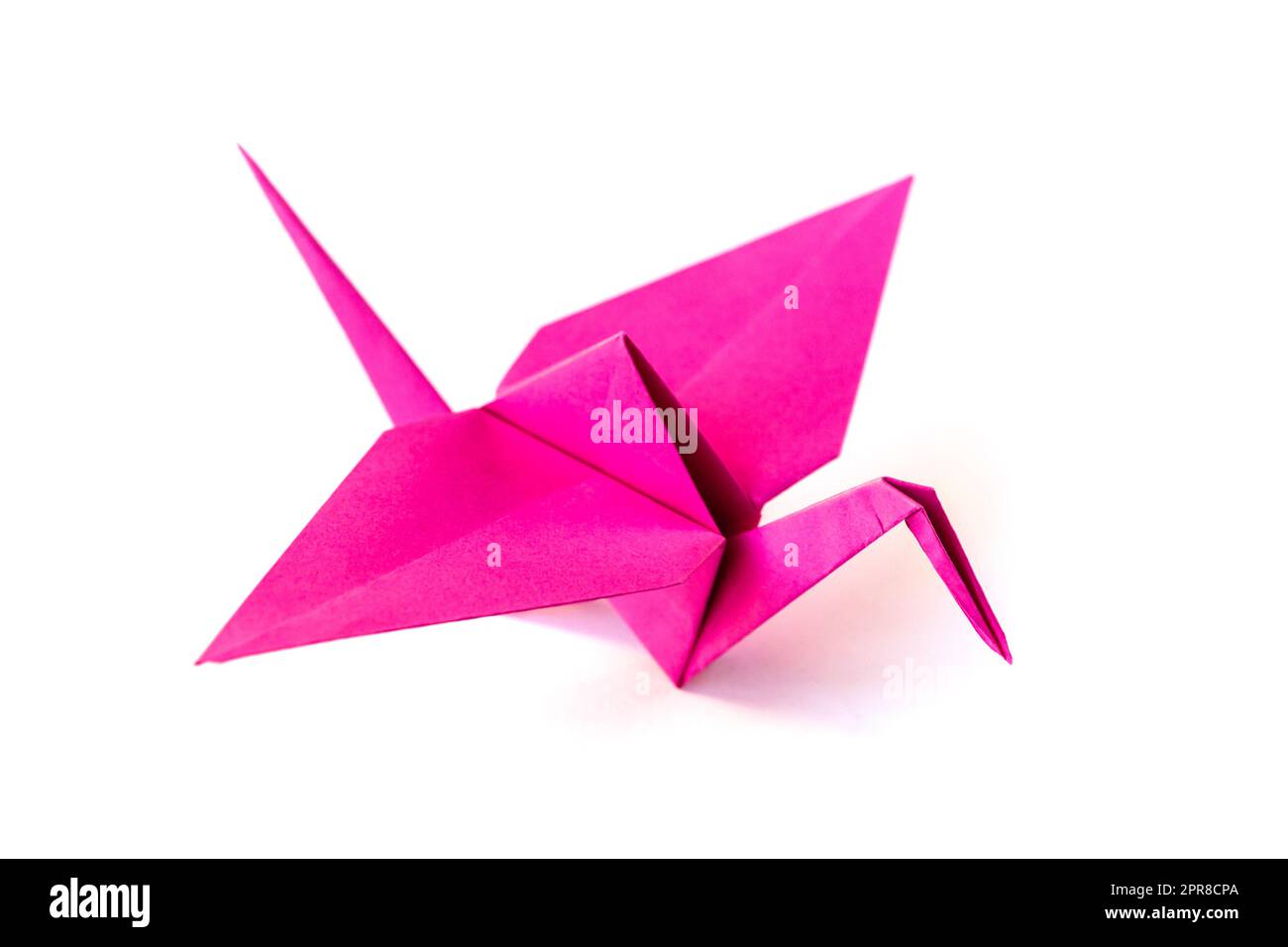 Pink paper crane origami isolated on a white background Stock Photo Alamy