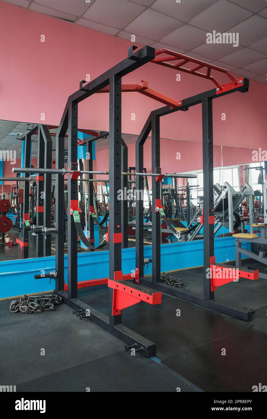 Reinforced Squat Rack with safety ropes in gym Stock Photo Alamy