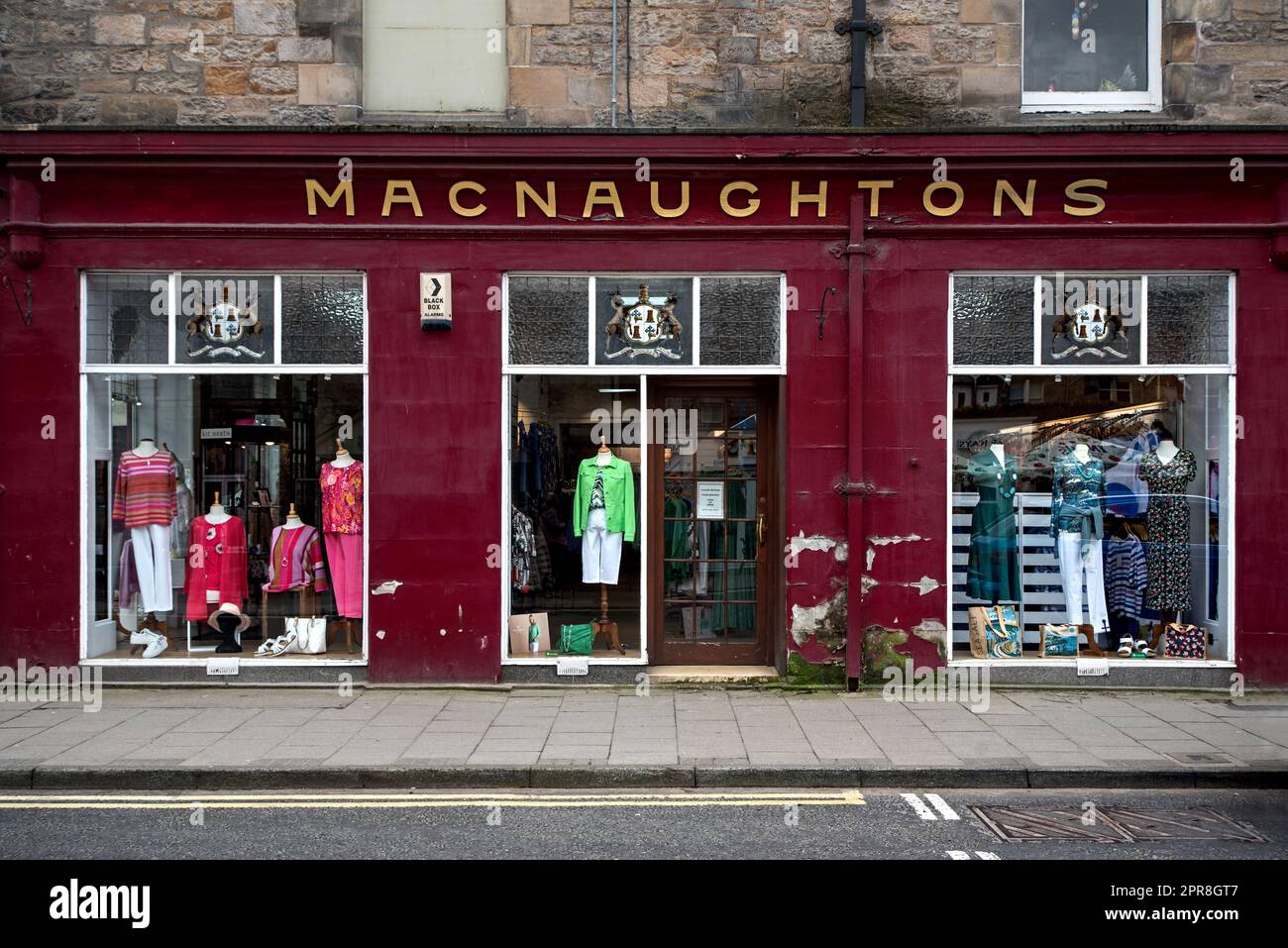 Exterior view of Macnaughtons of Pitlochry store on the corner of Atholl Road and Station Street in Pitlochry, Perth and Kinross, Scotland, UK. Stock Photo