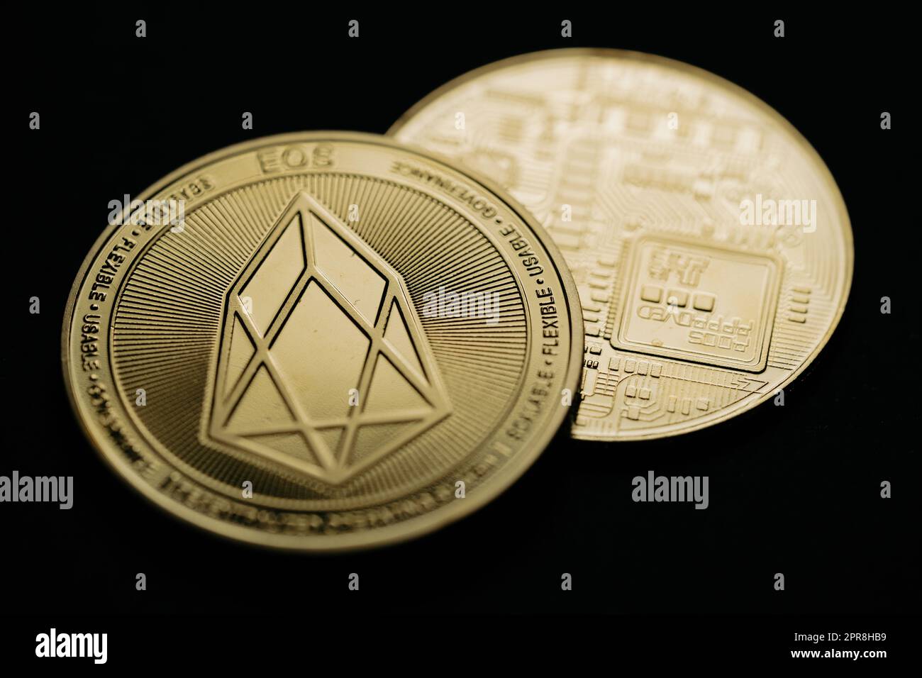 Golden EOS cryptocurrency Stock Photo