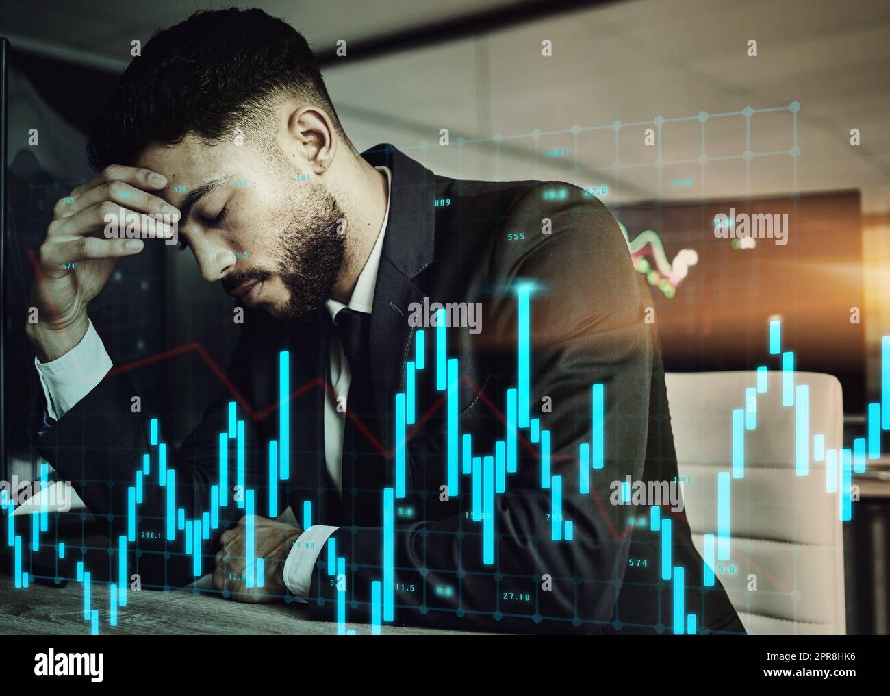 I need a break desperately. a young stock market expert looking stressed out at work. Stock Photo