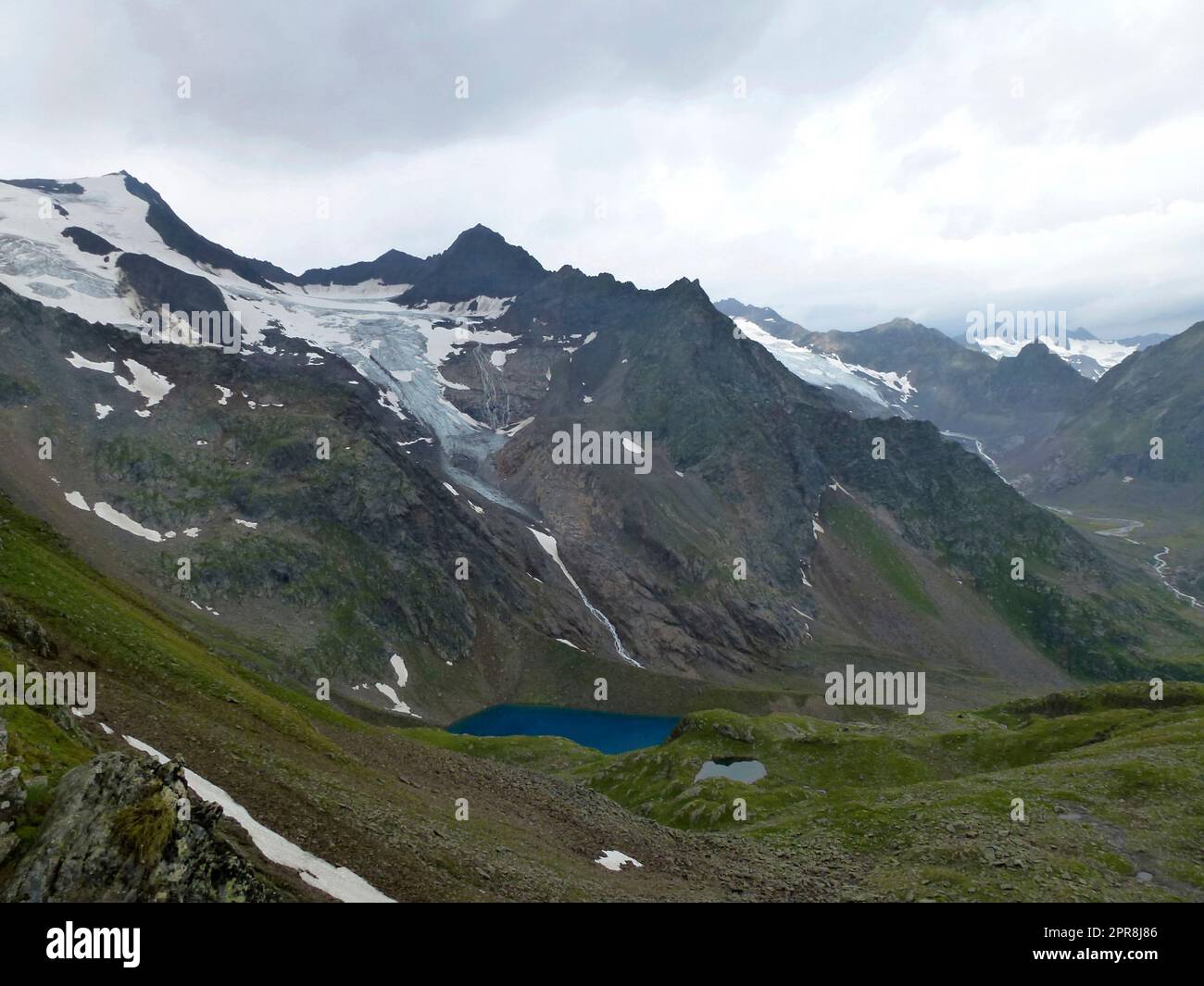 Blaue Lacke lake at Stubai high-altitude hiking trail, lap 6 in Tyrol, Austria Stock Photo
