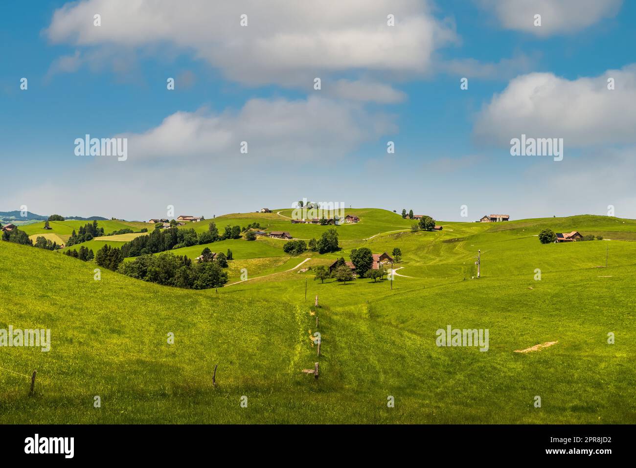 Mountain landscape with farmhouses and pastures, Appenzellerland, Switzerland Stock Photo