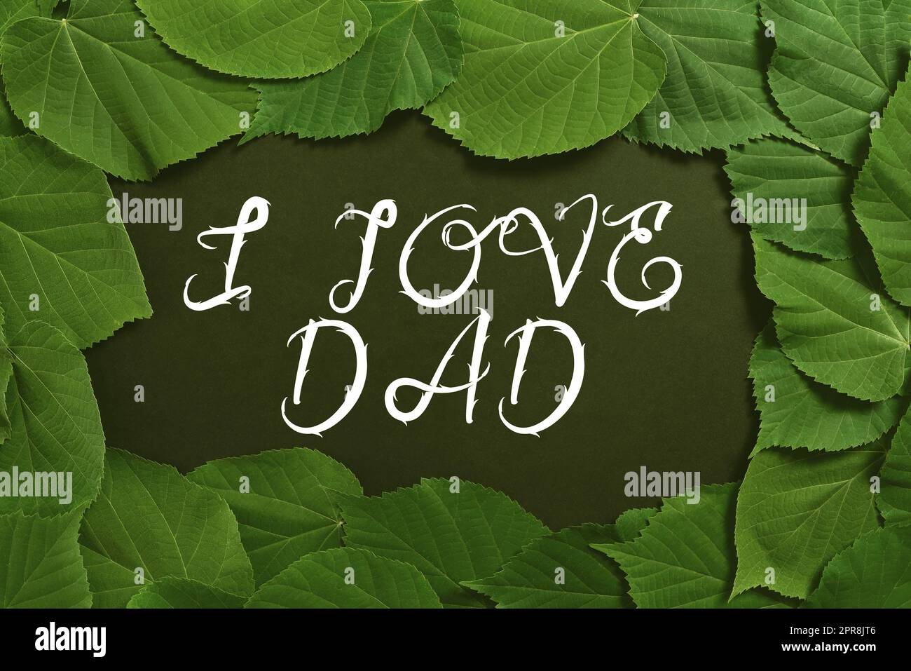 Text caption presenting I Love Dad. Business approach Good feelings about my father Affection loving happiness Important Informations Written On Paper Under Lot Of Leaves. Stock Photo