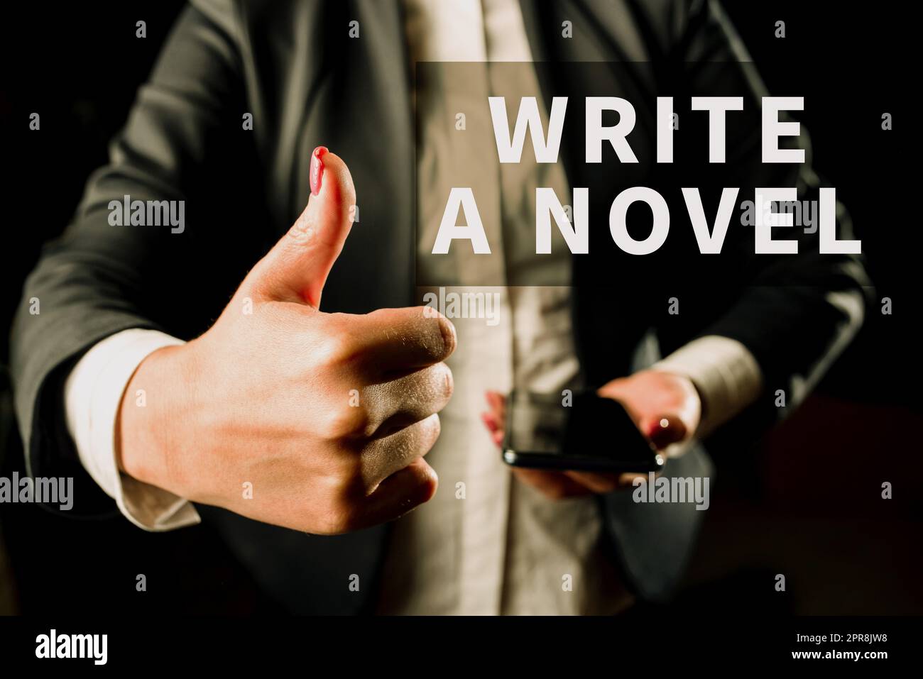 Conceptual display Write A Novel. Business concept Be creative writing some literature fiction become an author Businesswoman Holding Cellphone In One Hand And Showing Thumbs Up. Stock Photo