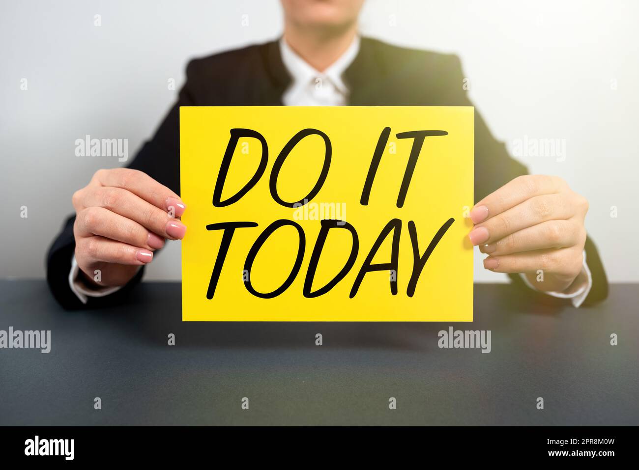 Conceptual caption Do It Today. Concept meaning Respond now Immediately  Something needs to be done right away Businesswoman Holding Note With  Important Message On Office Desk Stock Photo - Alamy