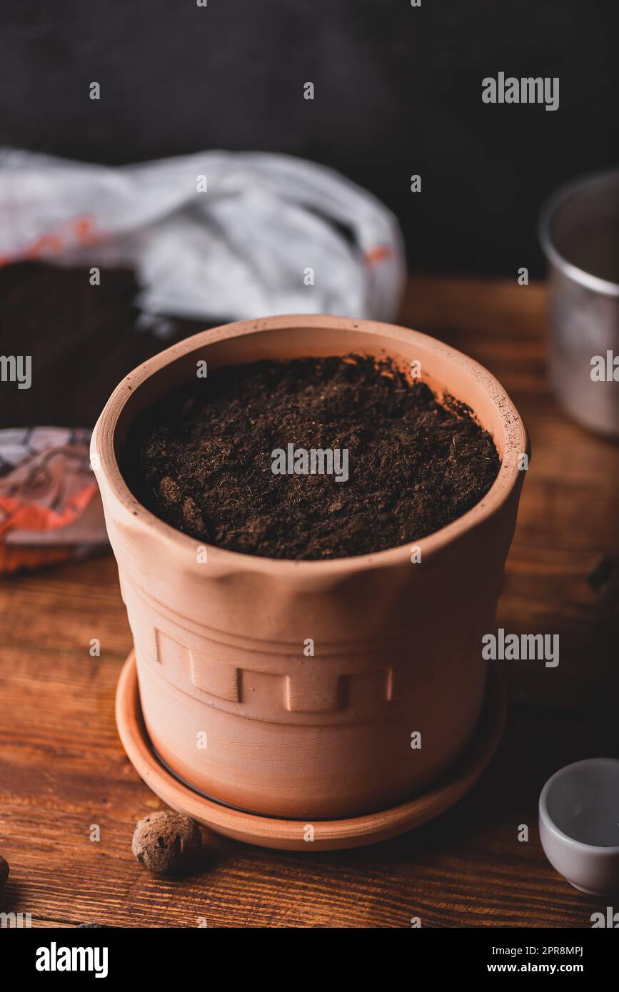 Flower Pot Filled with Soil Stock Photo Alamy