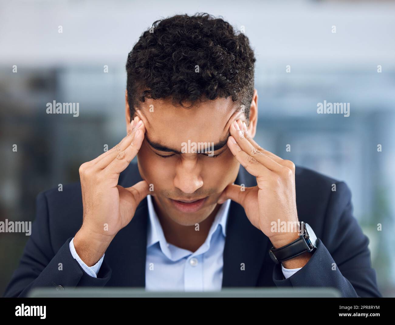 Where has all my focus gone to. a young businessman looking stressed out while working in an office. Stock Photo