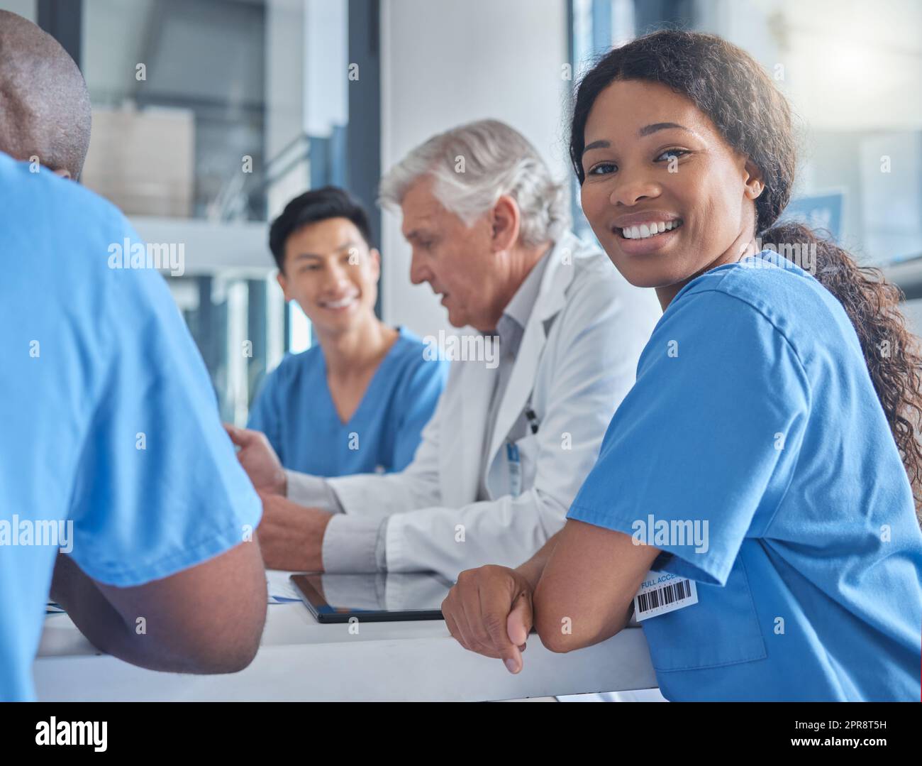 These meetings keep the hospital running. Cropped portrait of an