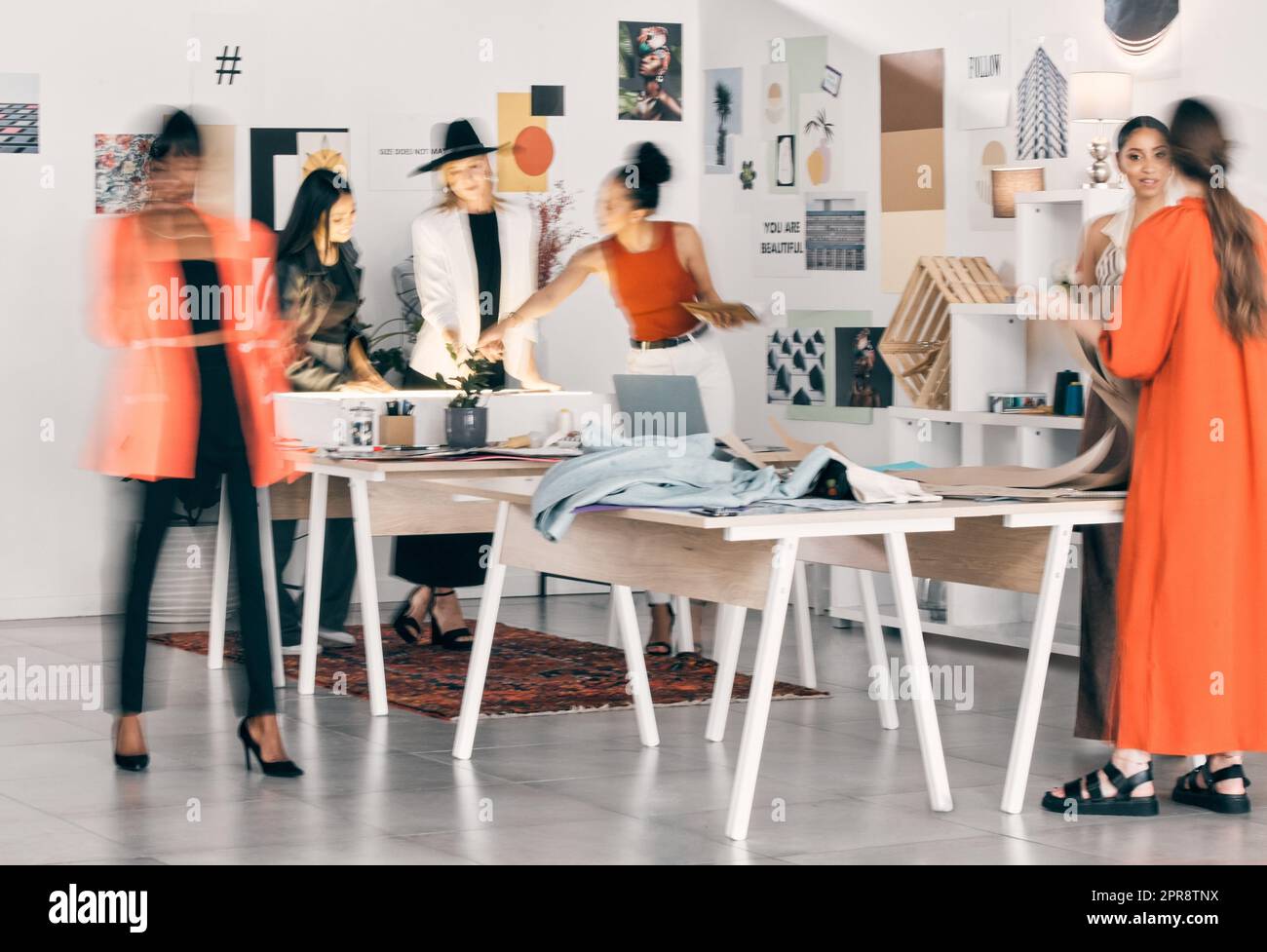 Constant altering. a group of designers collaborating at a workshop together. Stock Photo