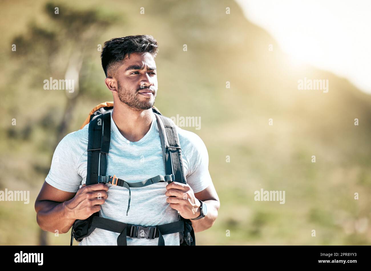 Young man standing nature hi-res stock photography and images - Alamy