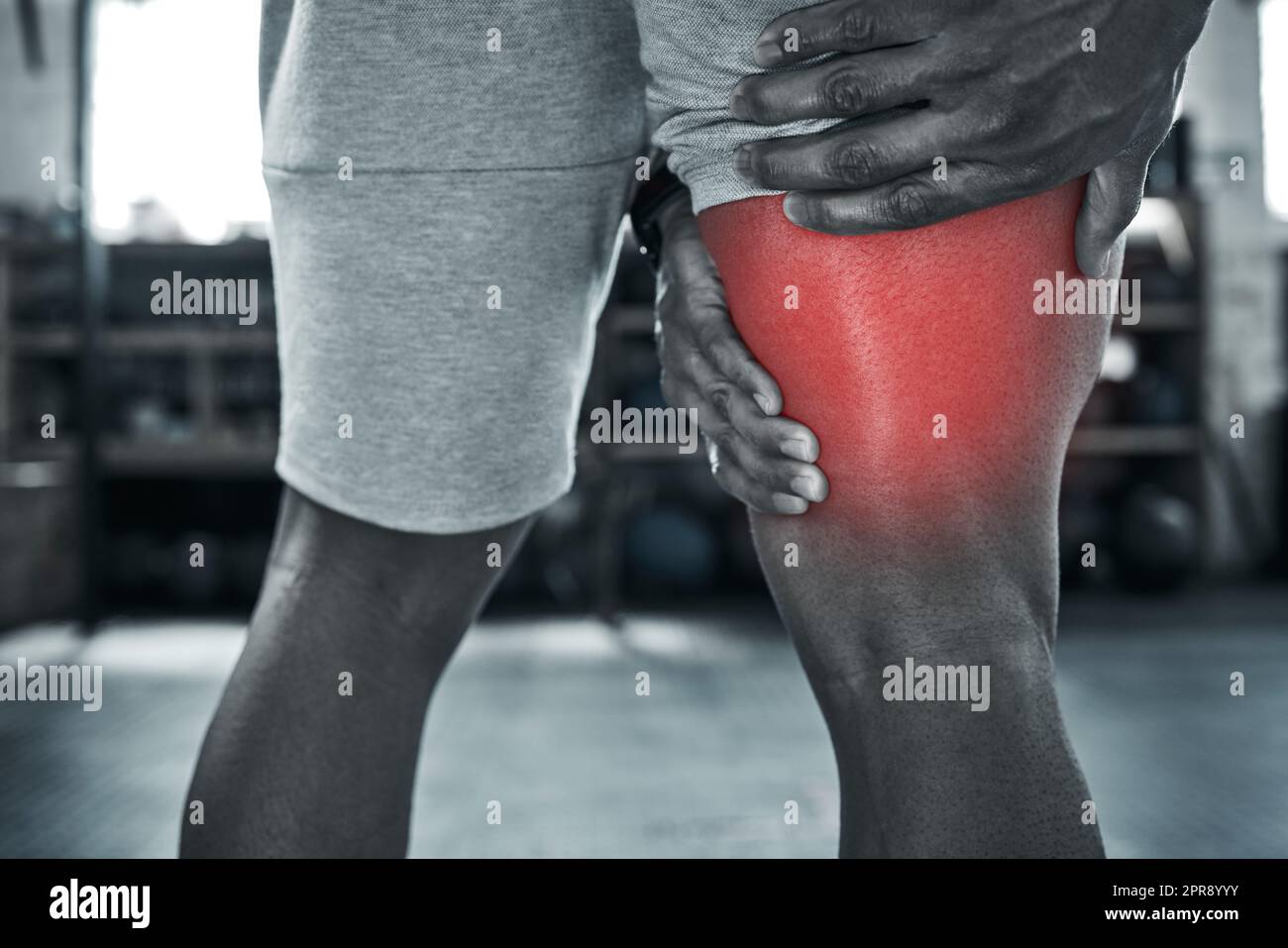 The back of the thigh always hurts. hands of a bodybuilder holding his hurt leg. Leg cramps can hit any athlete. Being fit needs strength. Physical pain from injury can be prevented when exercising. Stock Photo