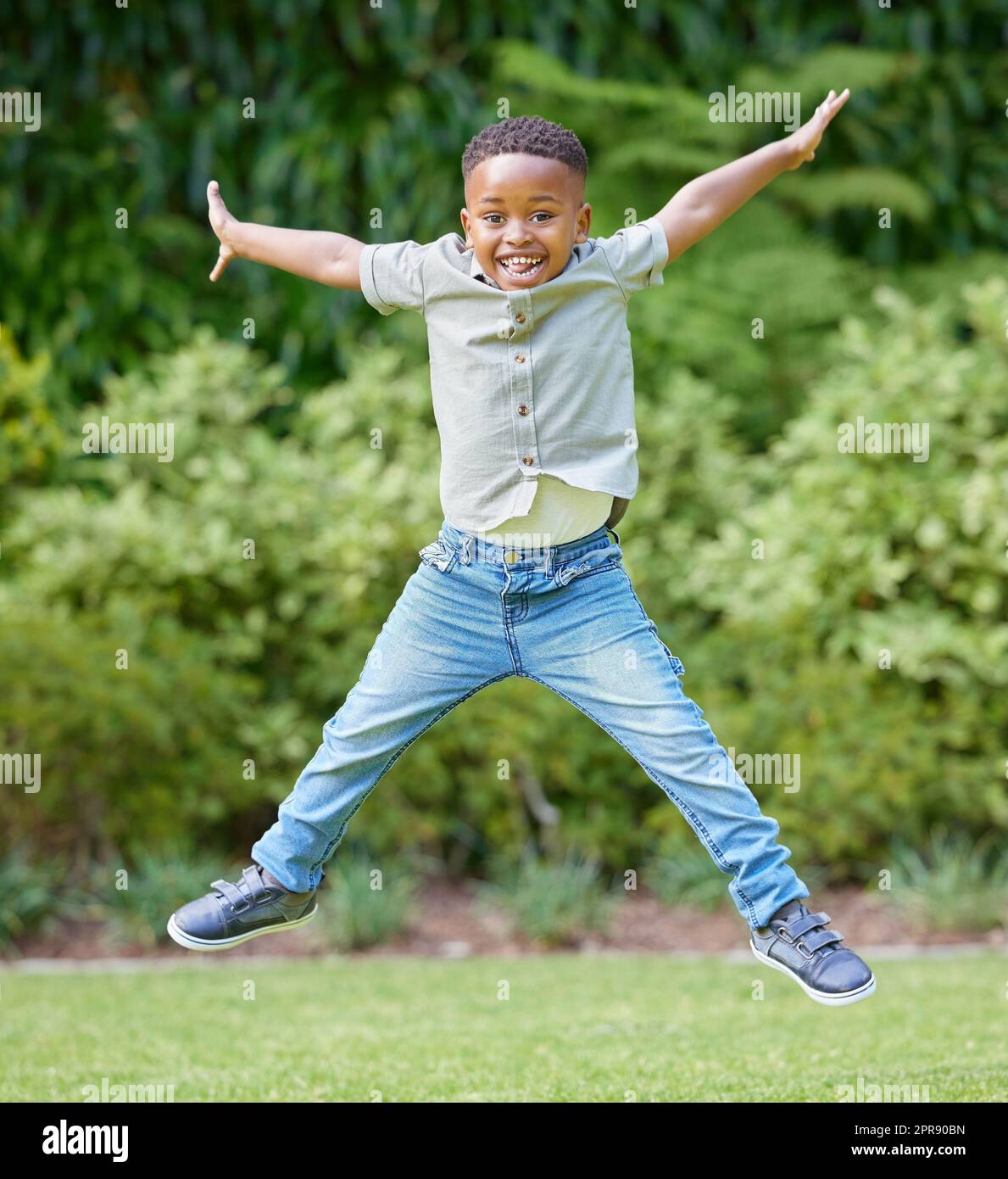 Boy playing outside hi-res stock photography and images - Alamy