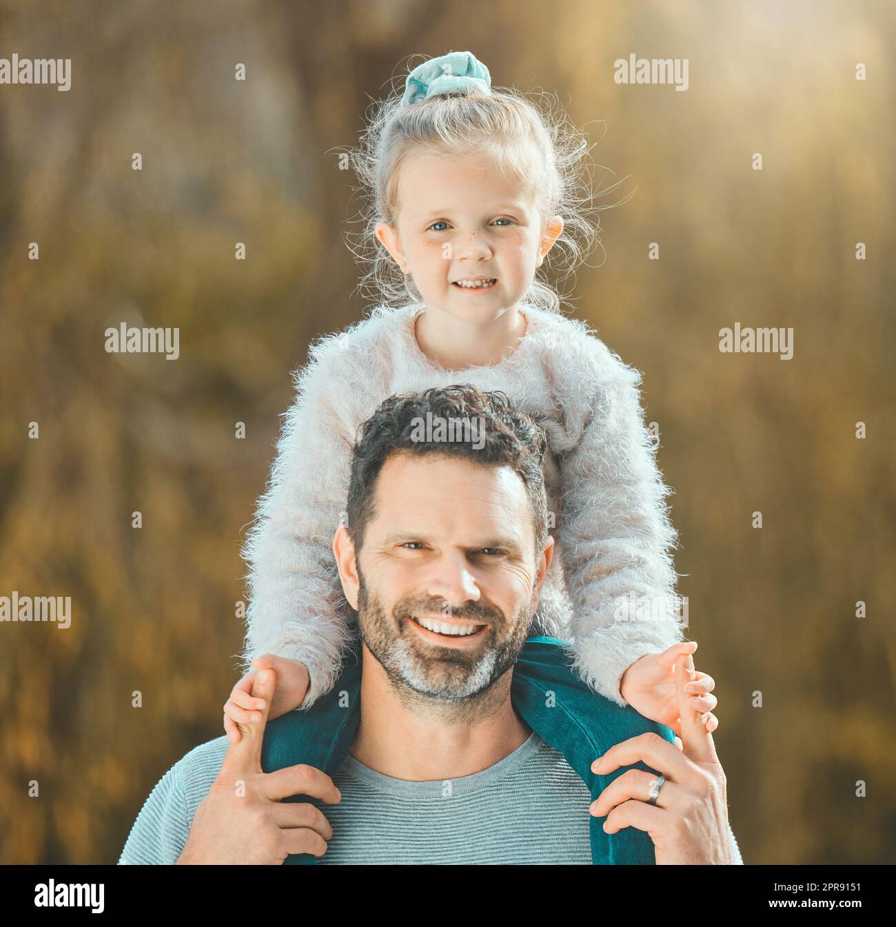 To me you know youll always be my little girl. a father spending time outdoors with his young daughter. Stock Photo