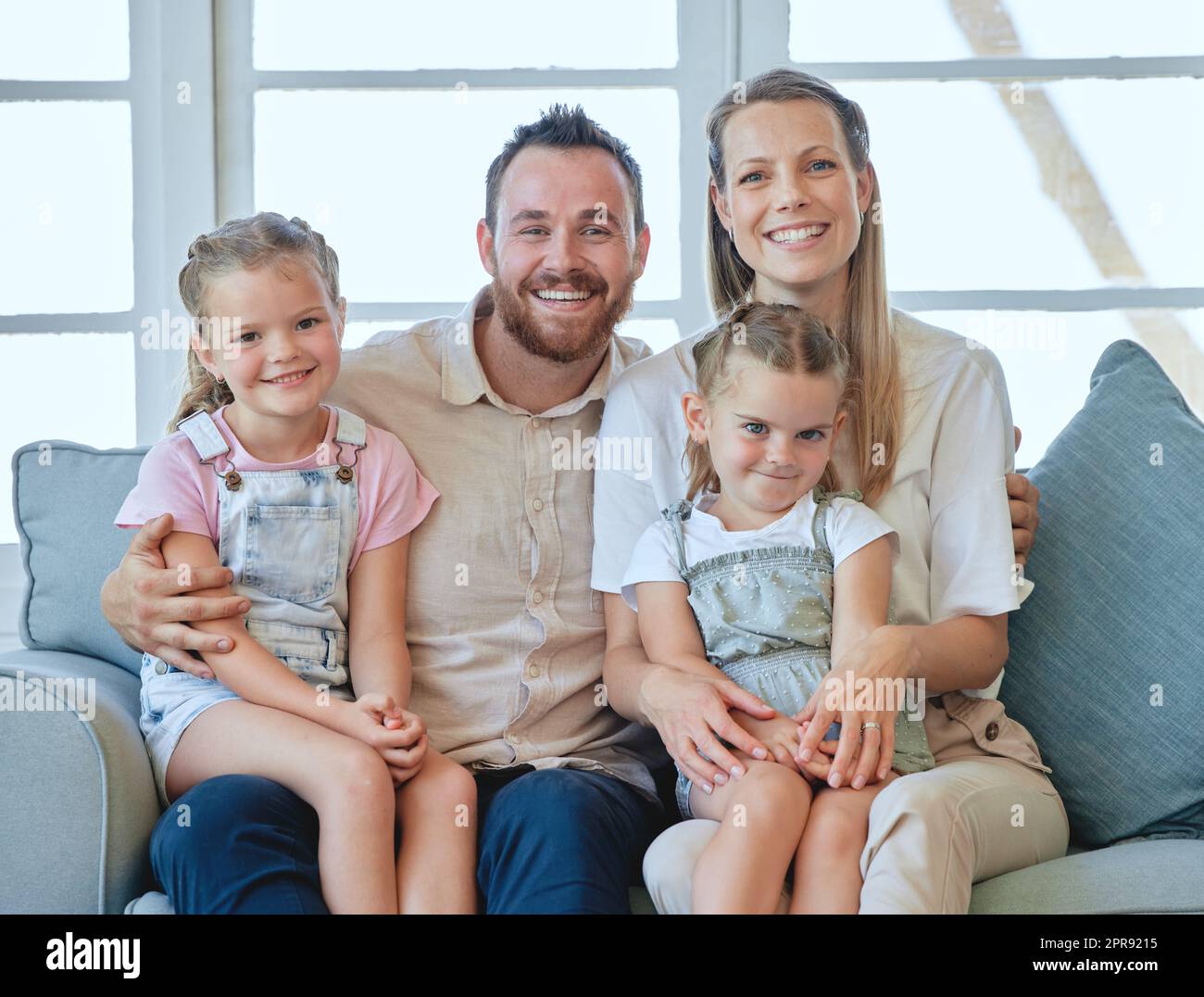Love and appreciate everyone in your life. a young family relaxing together at home. Stock Photo