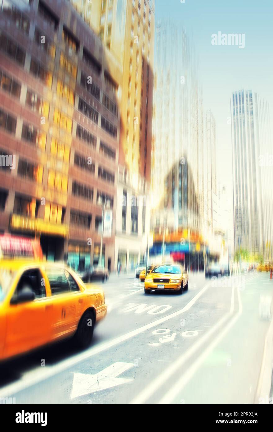 Busy scene with cars and taxis driving and traveling in blurred motion in the city. Commuting through a busy urban town, using public transport to travel the roads and streets to get to a destination Stock Photo