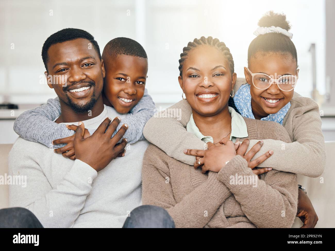 Appreciate every moment. a young family relaxing together at home. Stock Photo