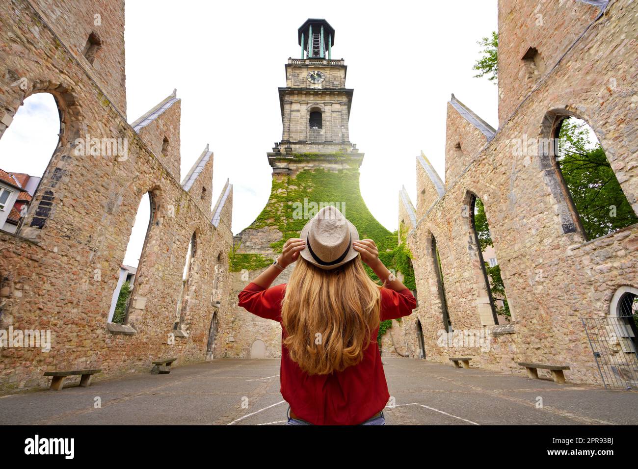 Tourism in Germany. Young woman tourist visiting the ruins of the