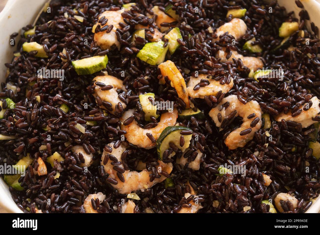 asian shrimps and black rice salad Stock Photo