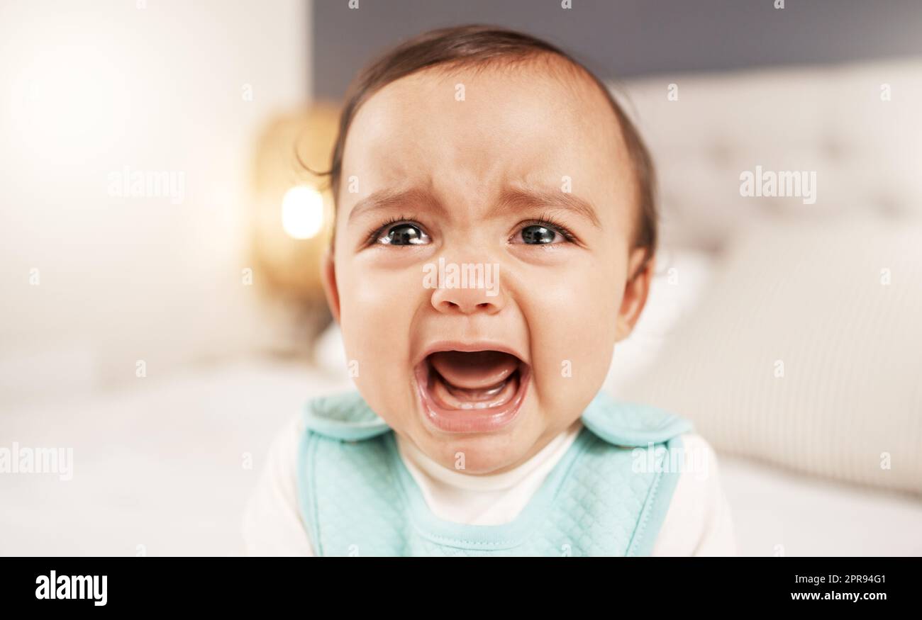 Dont you dare leave me alone. an adorable little girl crying while