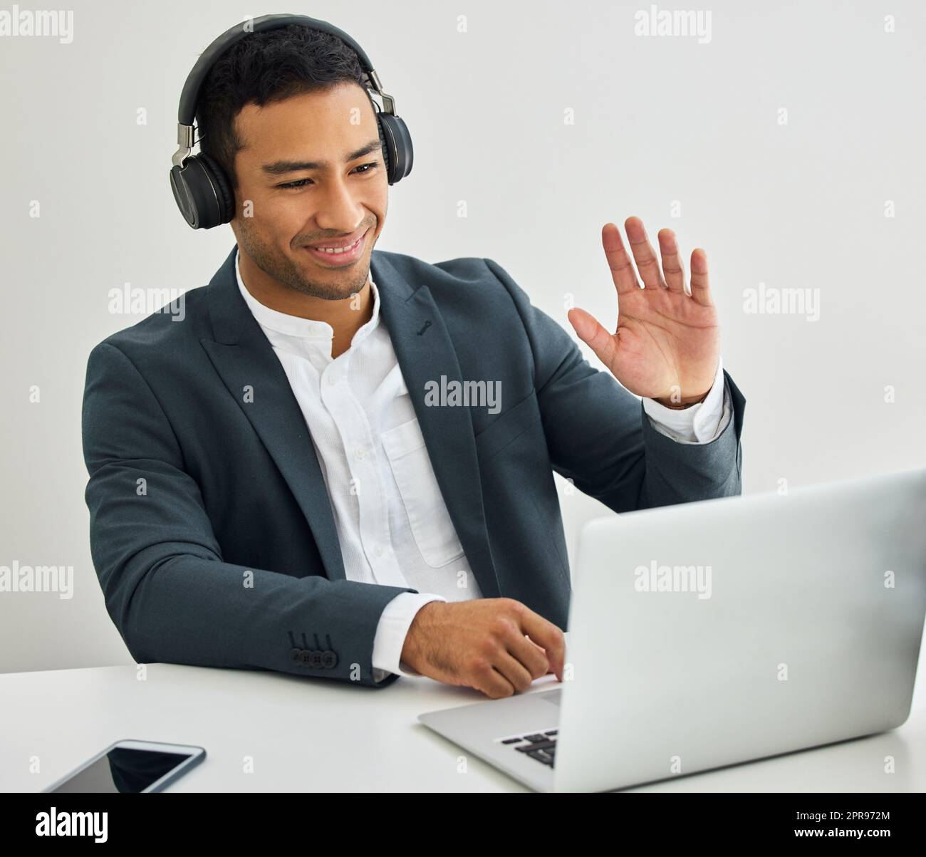 Lucky man, fire in my hands. a businessman on a video call in a modern office. Stock Photo