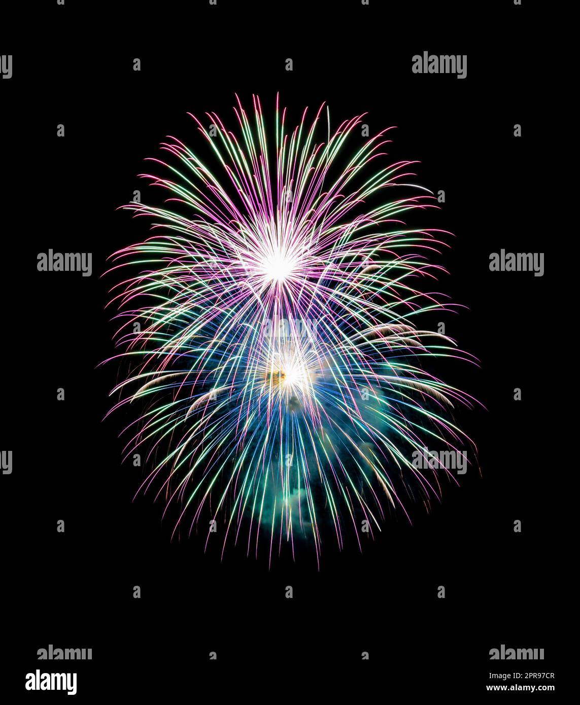 Brightly colorful fireworks in the night sky Stock Photo