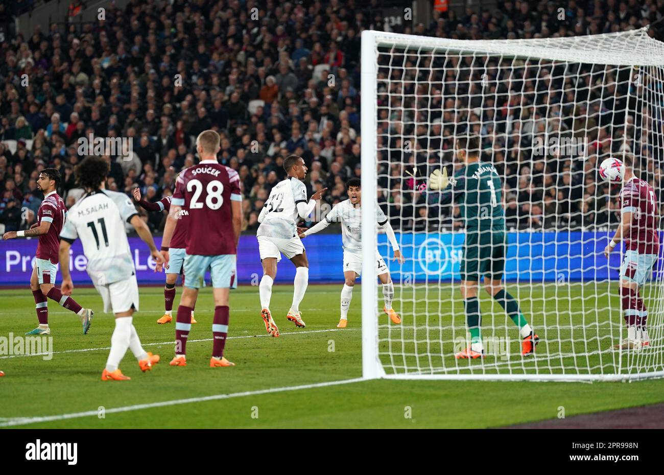 Liverpool's Joel Matip (centre left) celebrates scoring their side's second goal of the game during the Premier League match at the London Stadium. Picture date: Wednesday April 26, 2023. Stock Photo