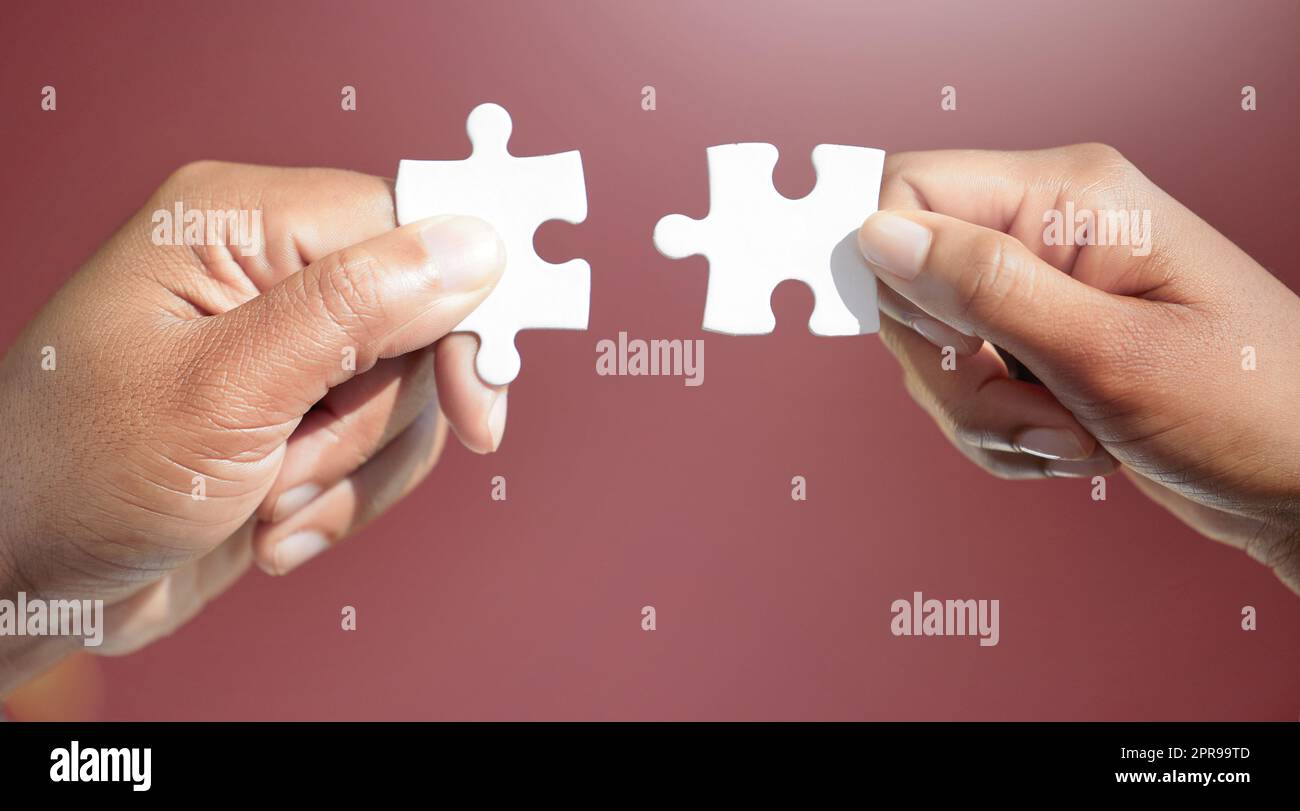 Working together to put things together. two unrecognizable